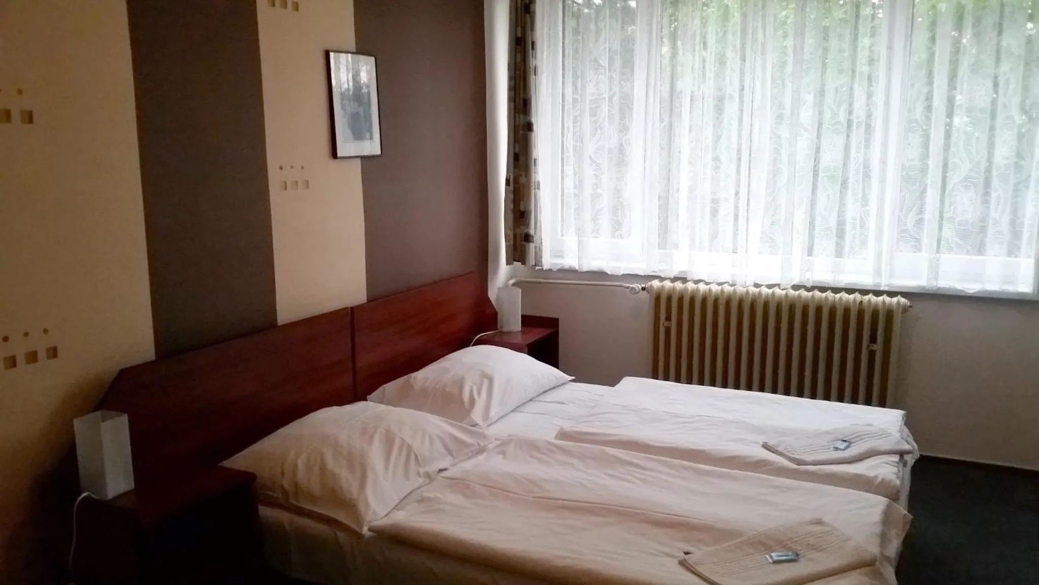 Photo of the whole room, Bed in Hotel Zimní stadion Náchod