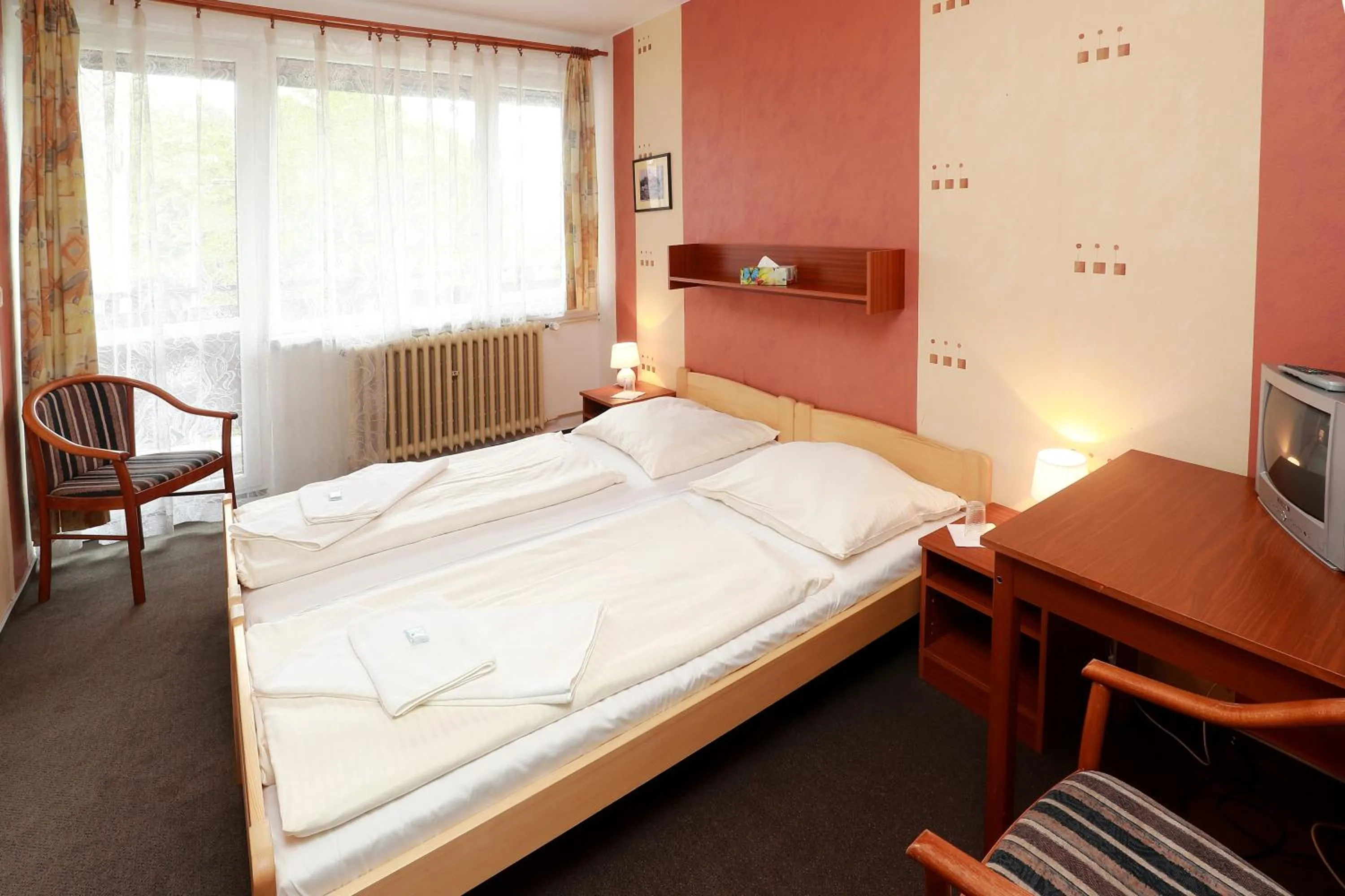 Photo of the whole room, Bed in Hotel Zimní stadion Náchod