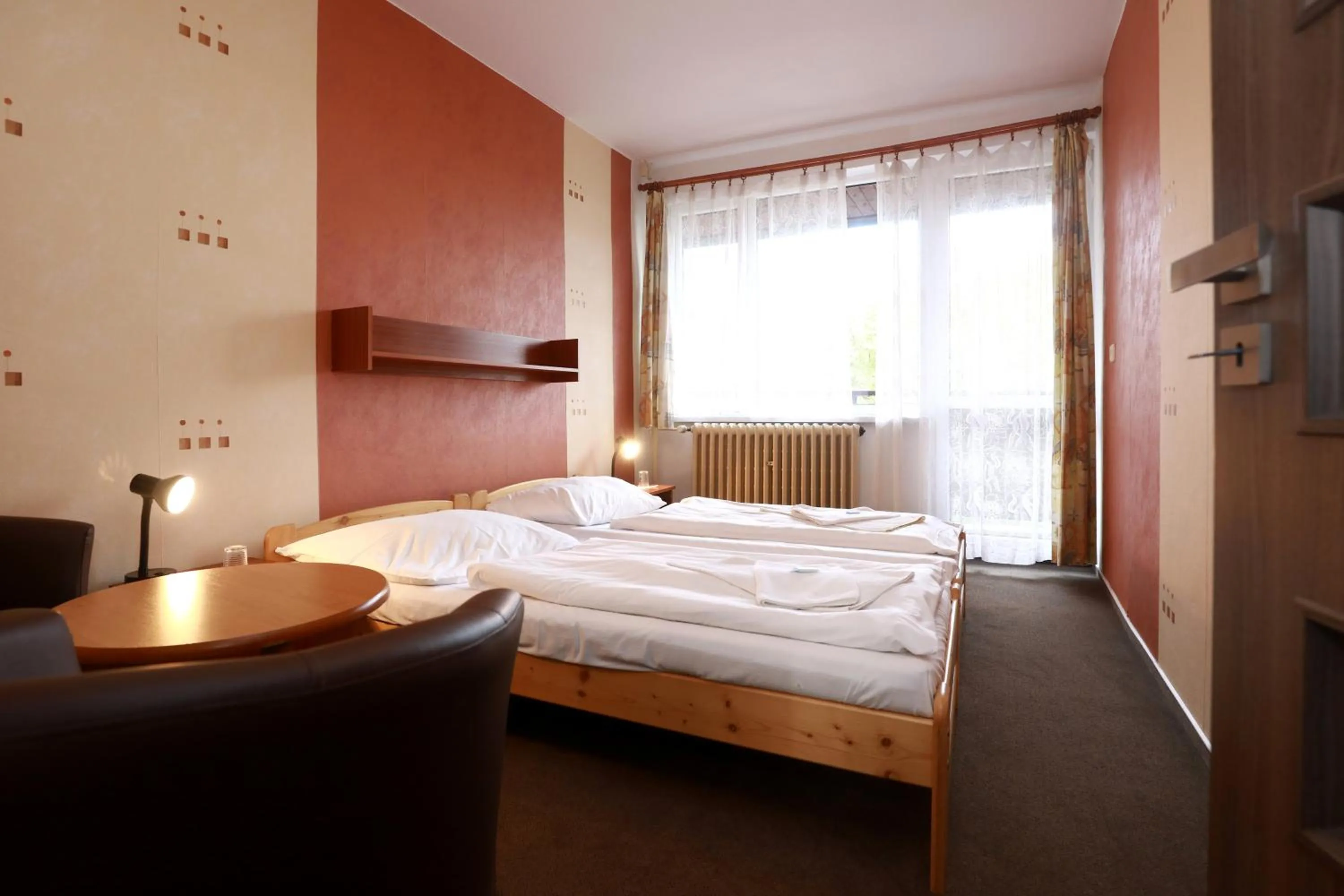 Photo of the whole room, Bed in Hotel Zimní stadion Náchod