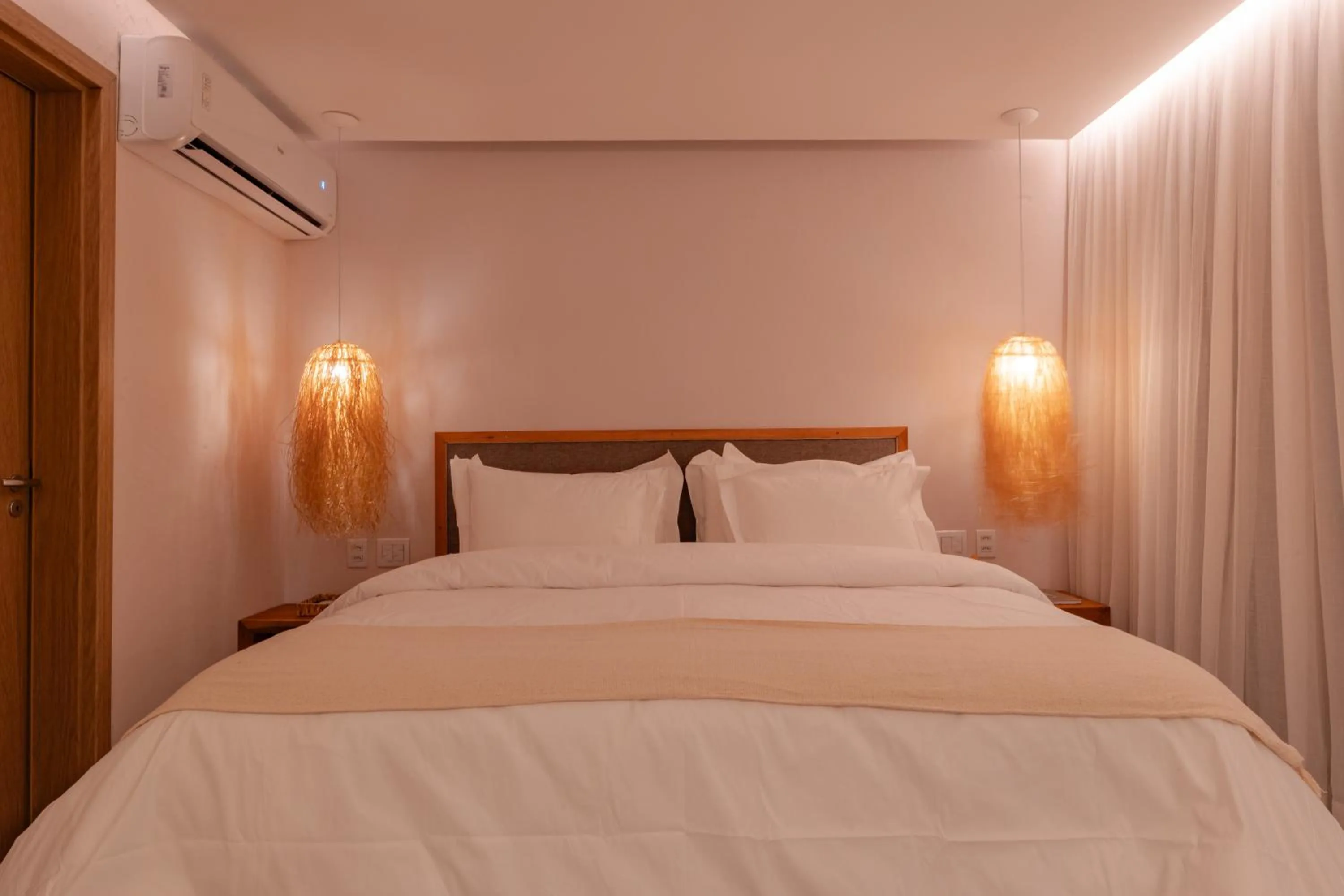 Bed in Pousada Aysú