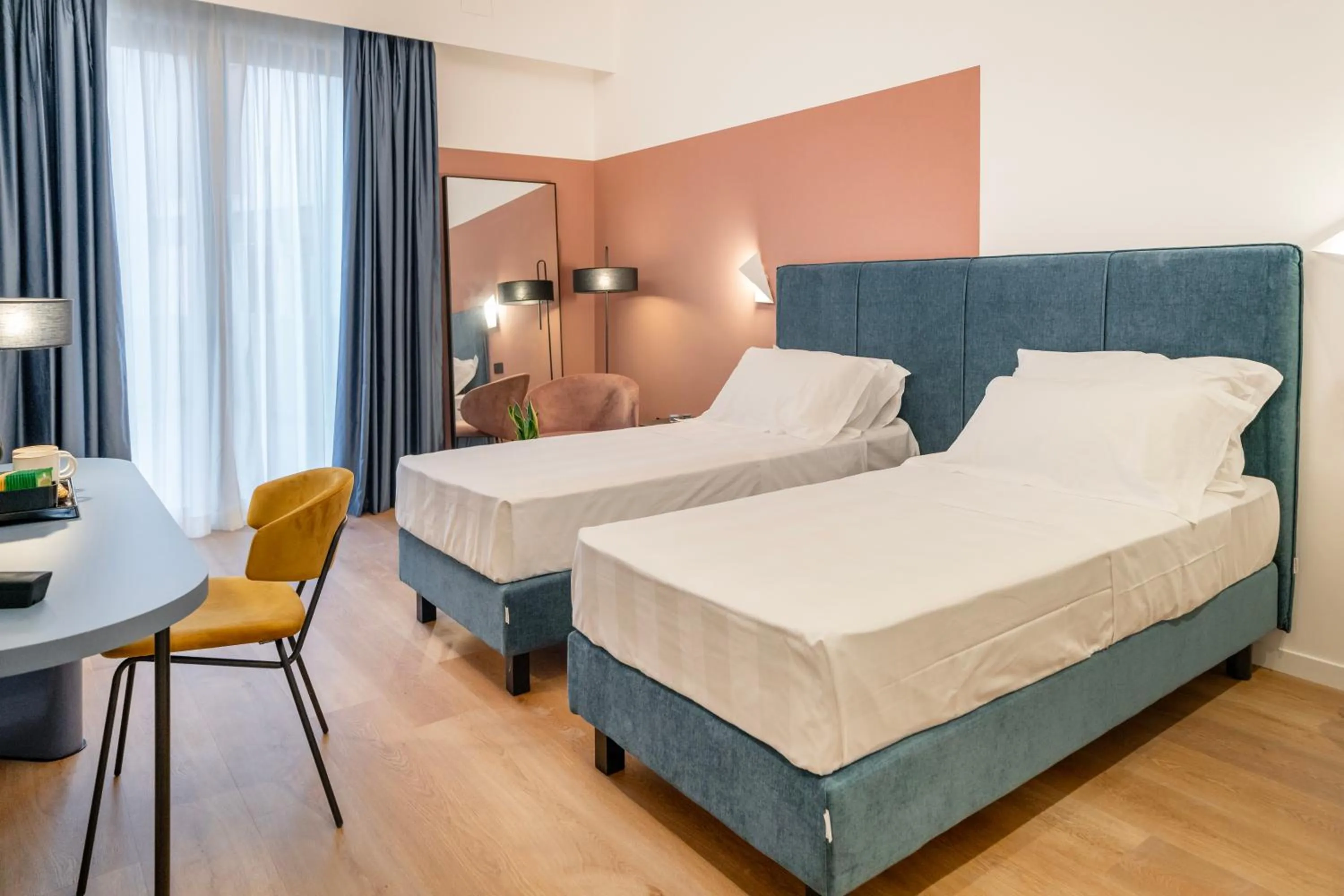 Bed in BISCARDI Hotel