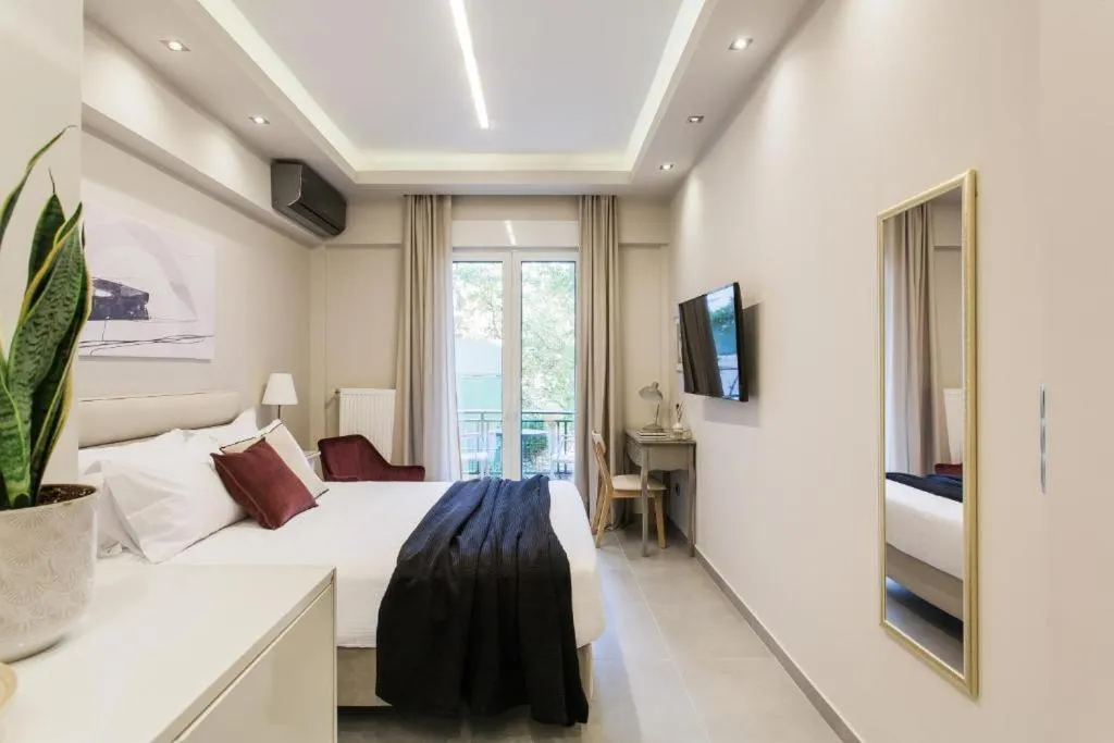Communal lounge/ TV room, Bed in Tranquil Studio in Pangrati Athens Center