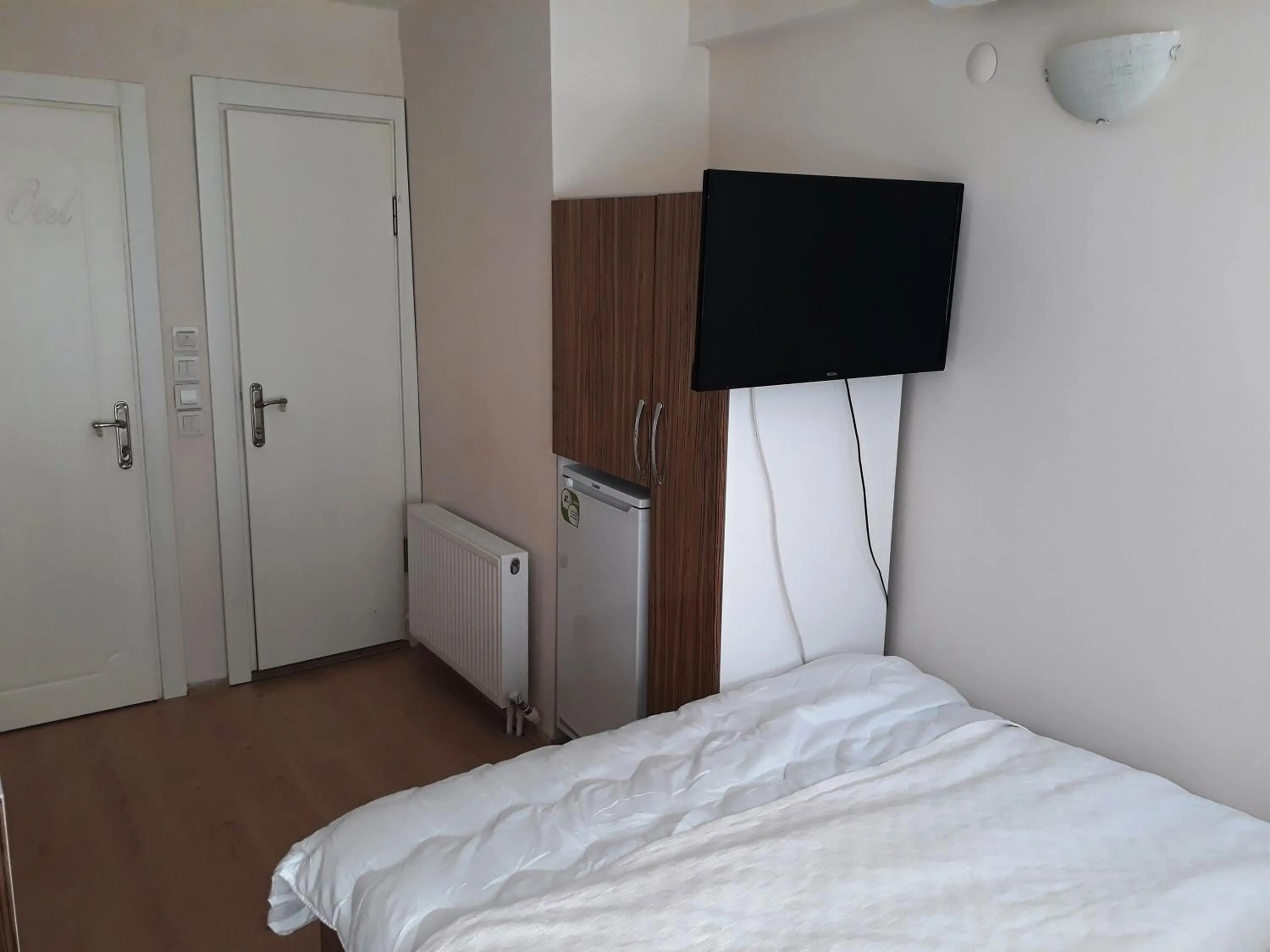 Photo of the whole room, Bed in Dilmac Hotel