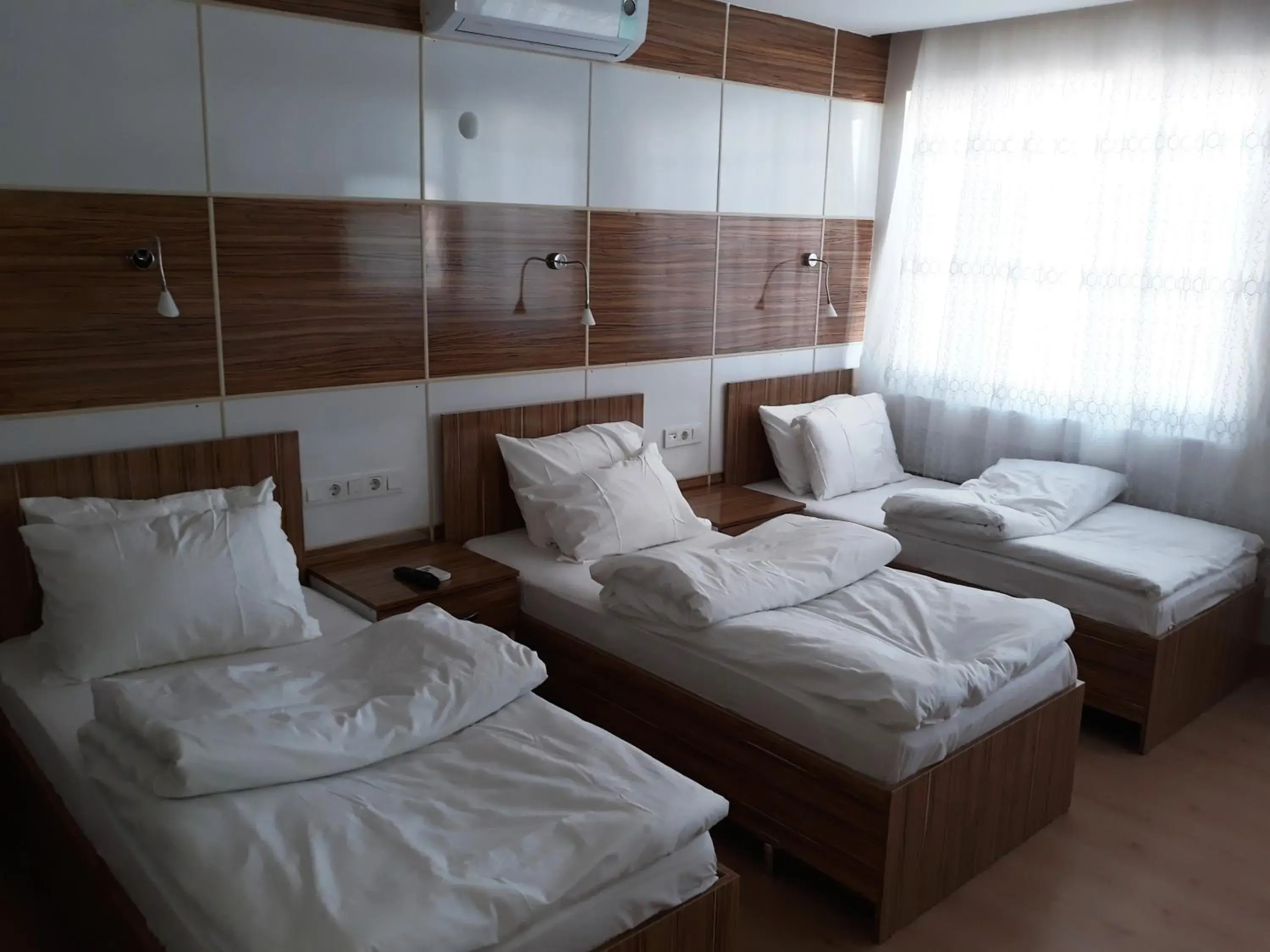 Comfort Quadruple Room - single occupancy in Dilmac Hotel Comfort Quadruple Room - single occupancy in Dilmac Hotel