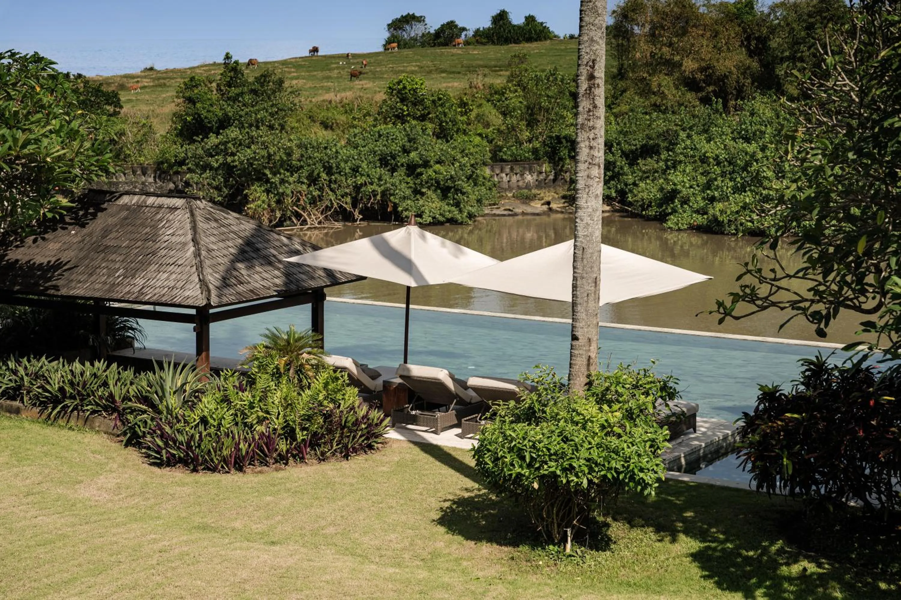 Swimming pool in OMEKAI Cemagi by Nakula