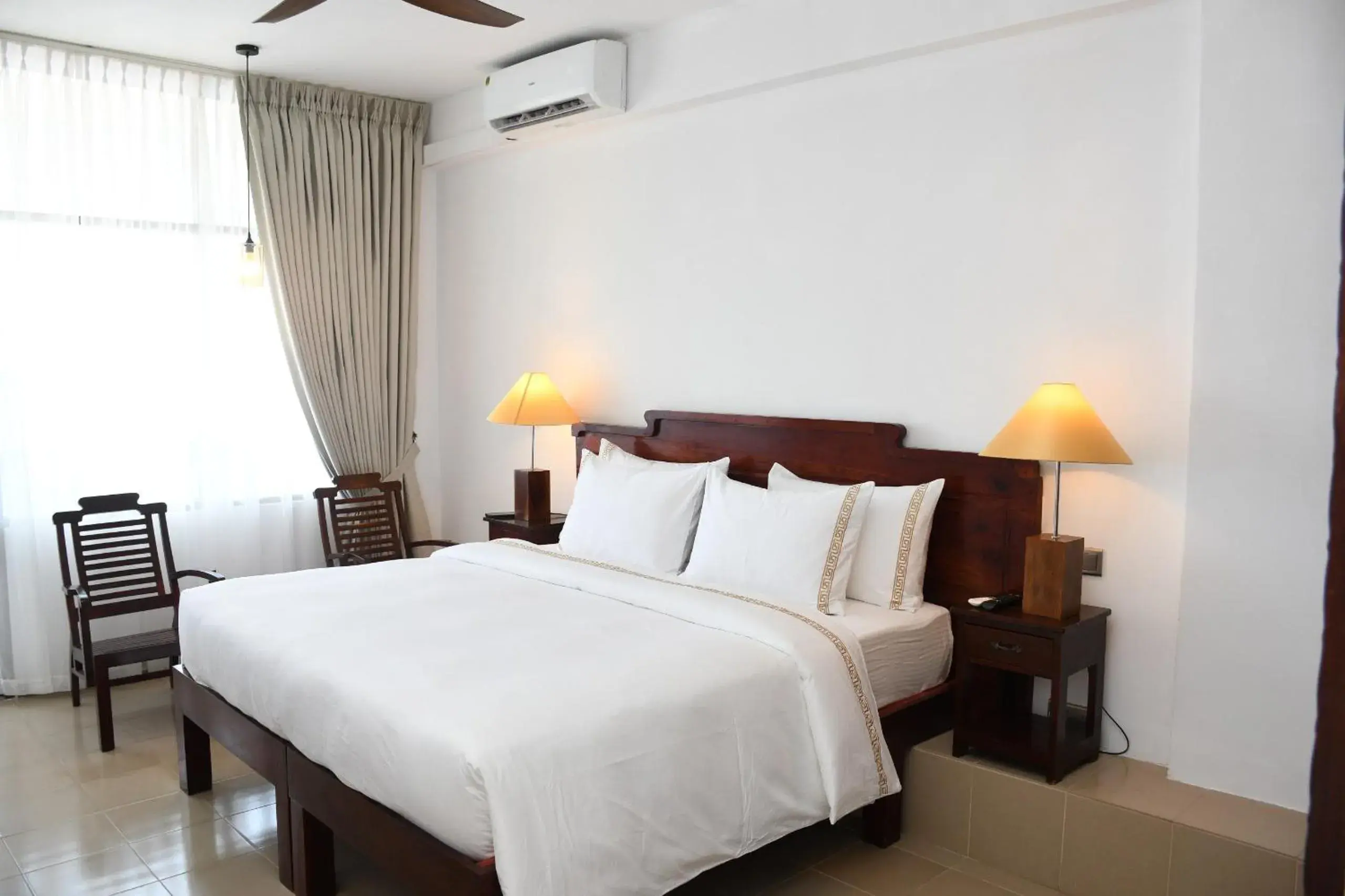 Seating area, Bed in Hotel Lanka Super Corals Seating area, Bed in Hotel Lanka Super Corals