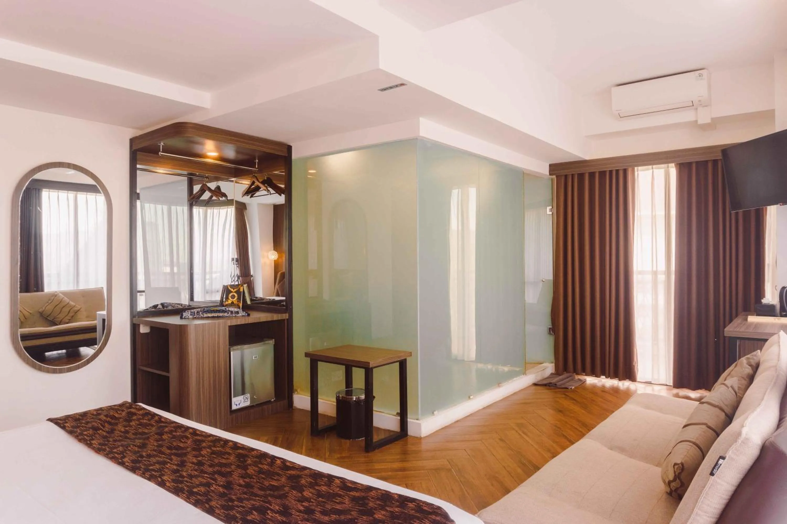 Bed in Fahira Hotel Syariah Bukittinggi