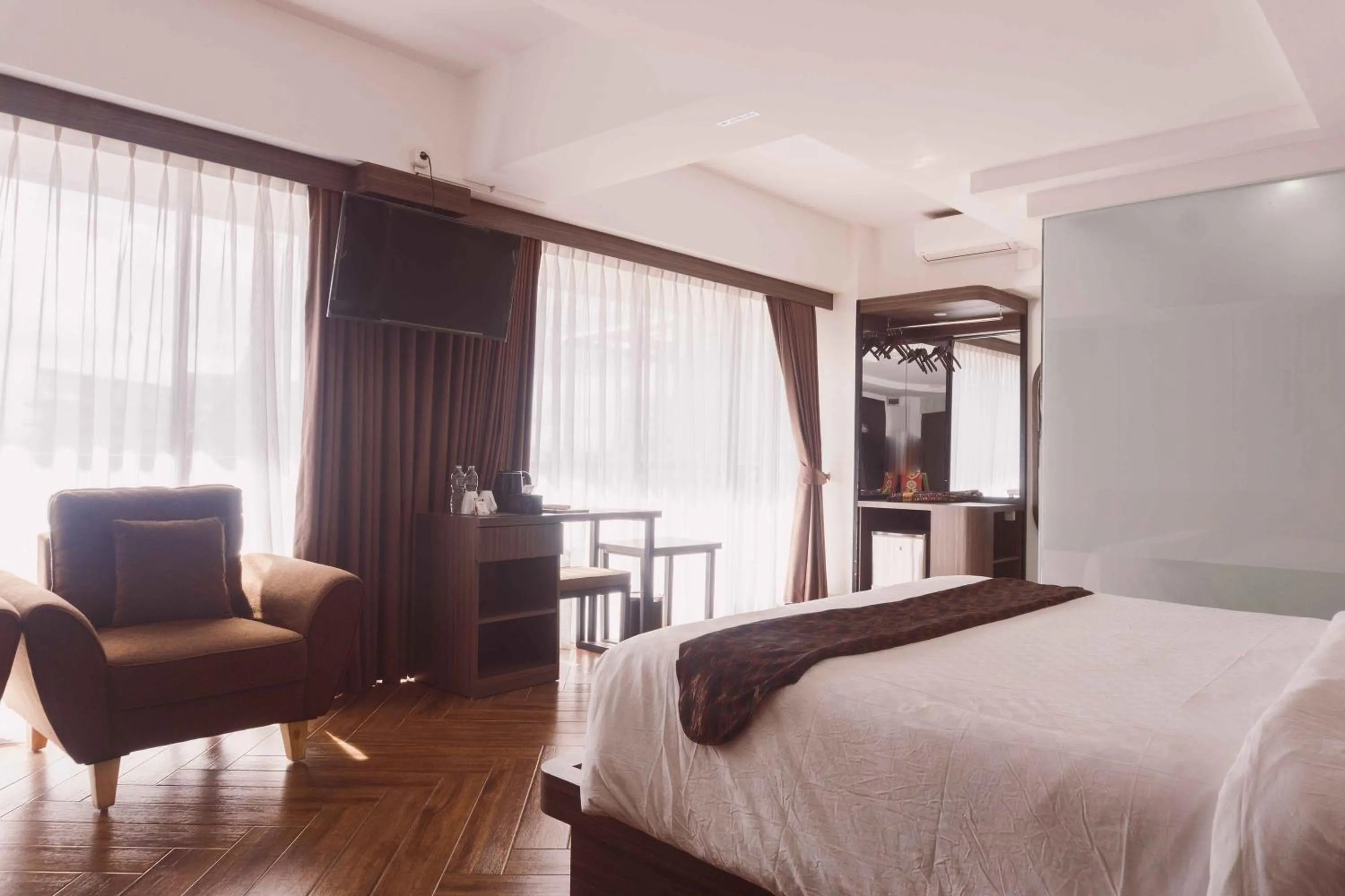 Bed in Fahira Hotel Syariah Bukittinggi