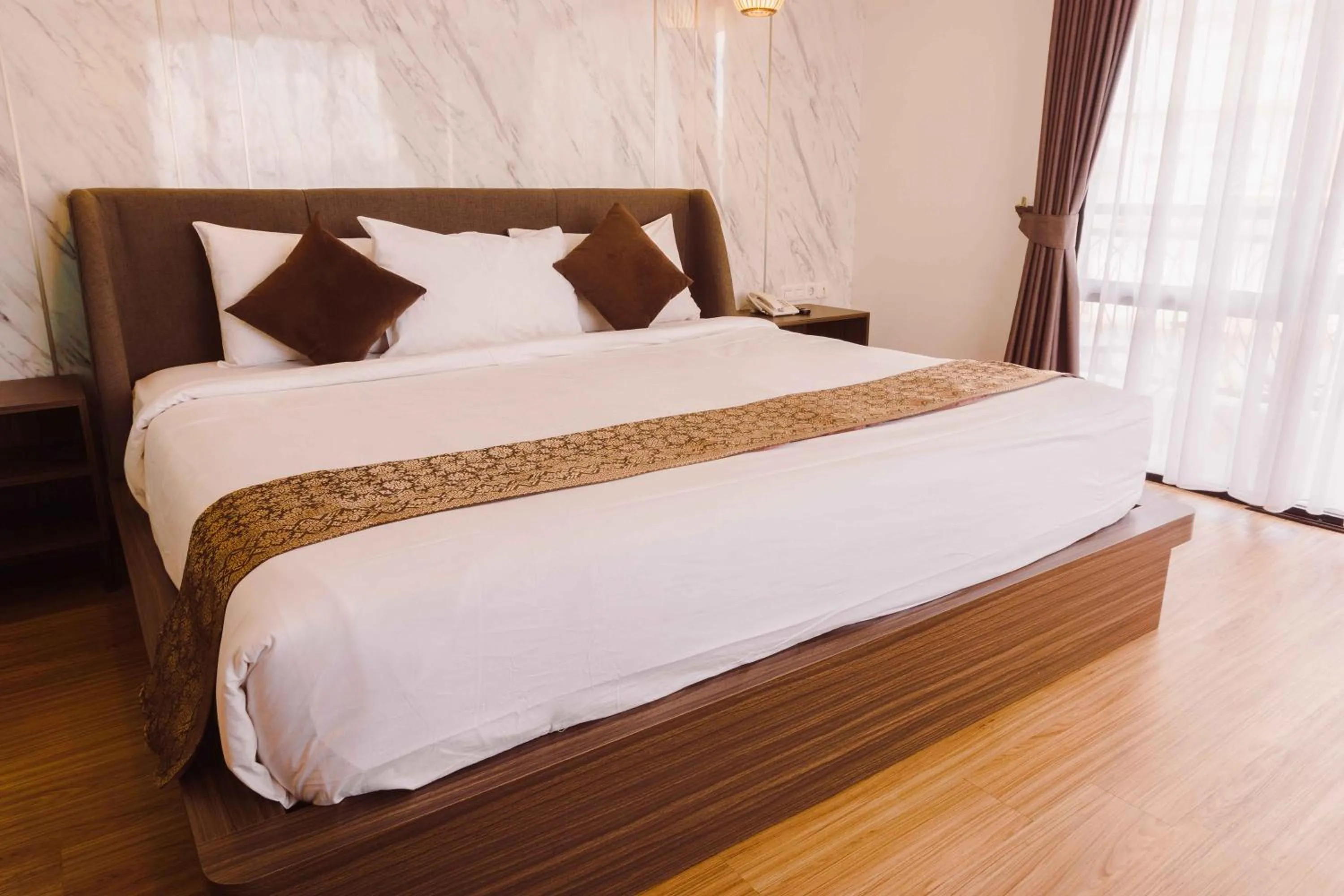 Bed in Fahira Hotel Syariah Bukittinggi