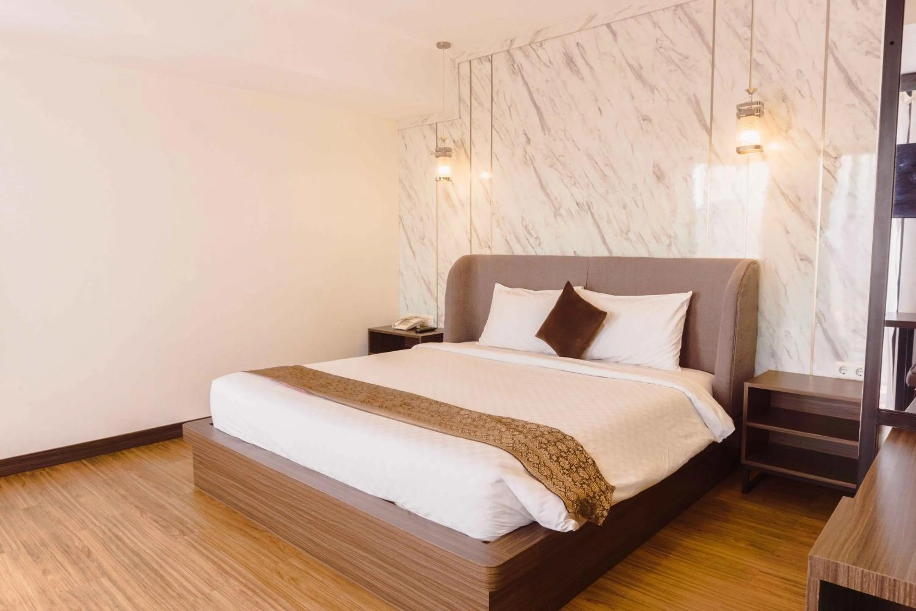 Bed in Fahira Hotel Syariah Bukittinggi