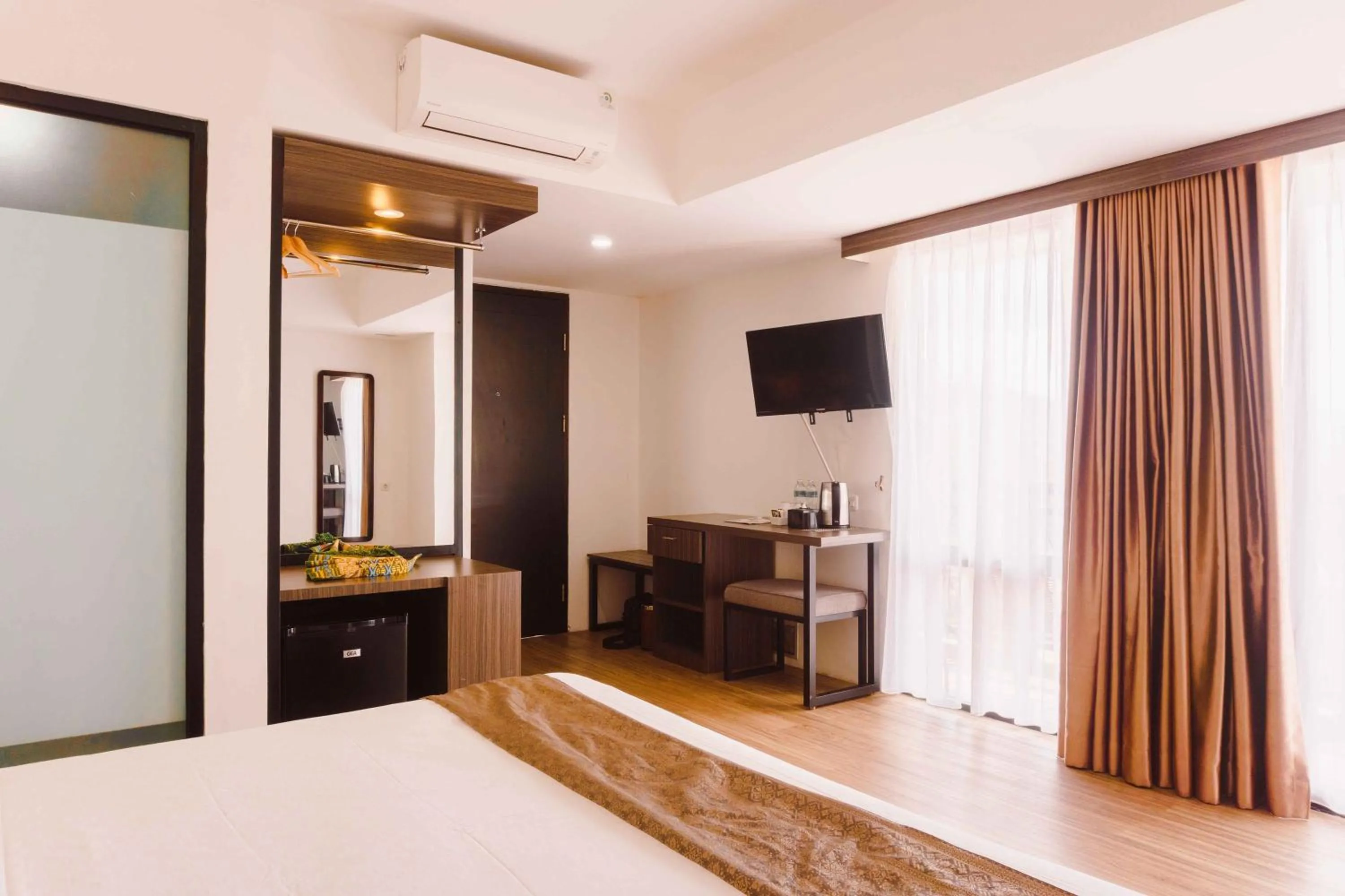 Bed in Fahira Hotel Syariah Bukittinggi