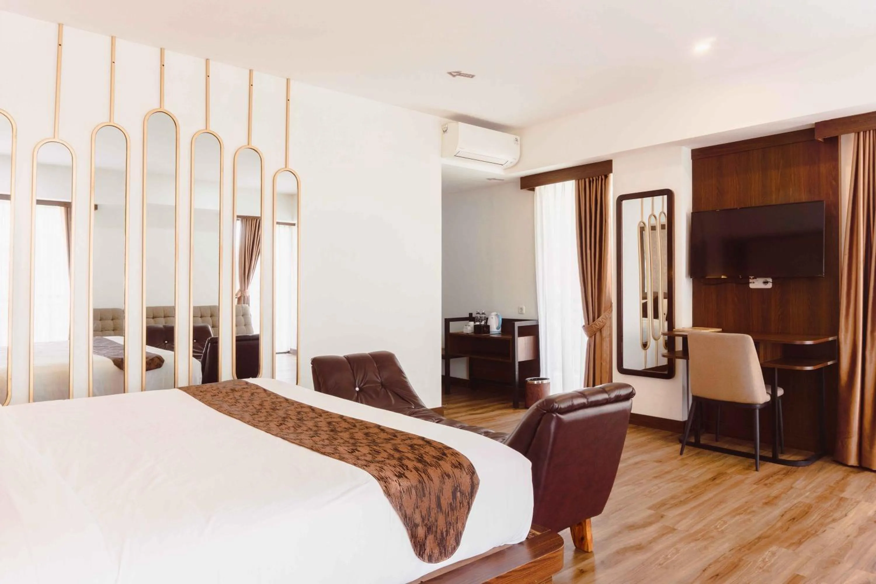 Bed in Fahira Hotel Syariah Bukittinggi