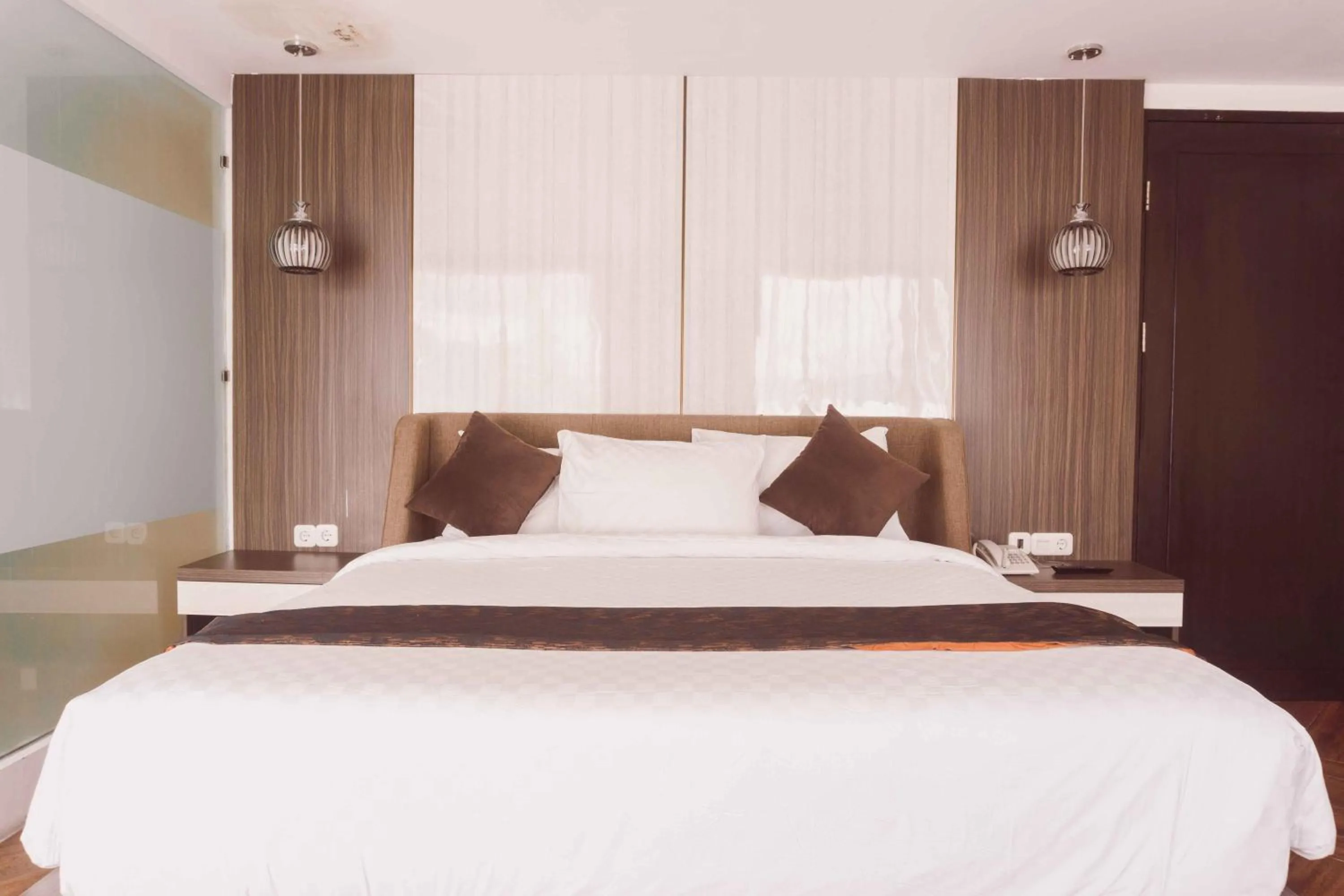 Bed in Fahira Hotel Syariah Bukittinggi