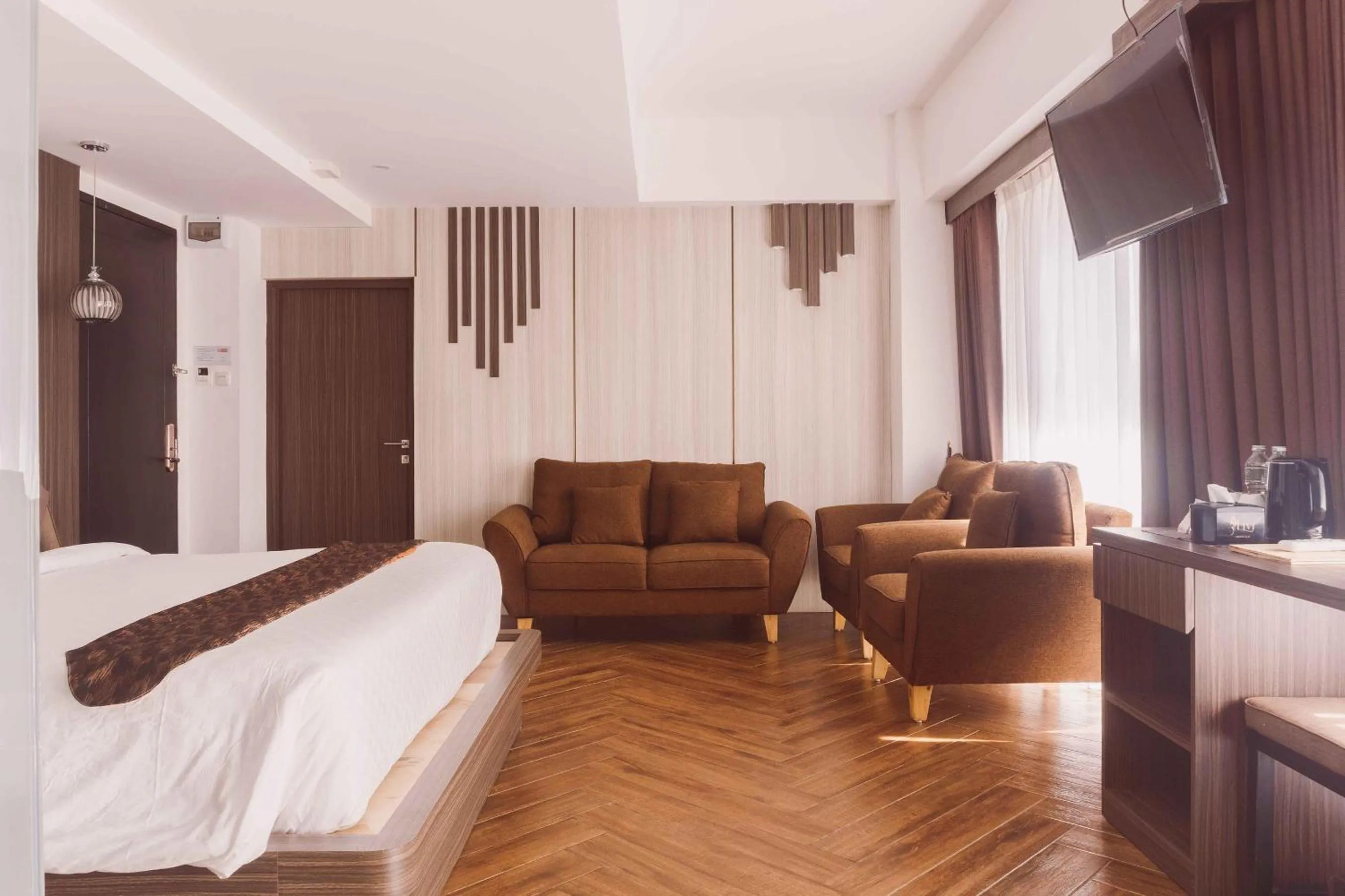 Bed in Fahira Hotel Syariah Bukittinggi