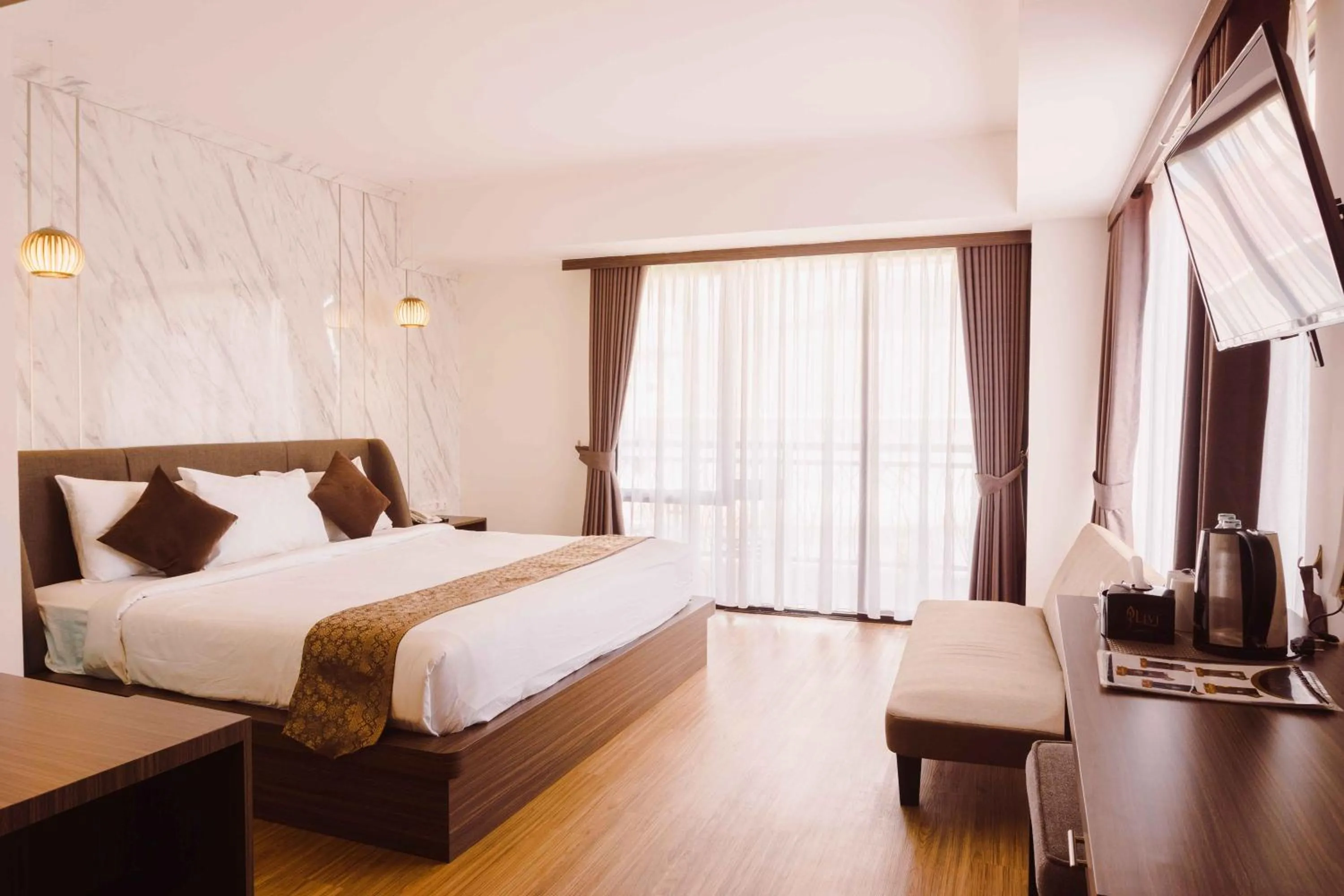 Bed in Fahira Hotel Syariah Bukittinggi