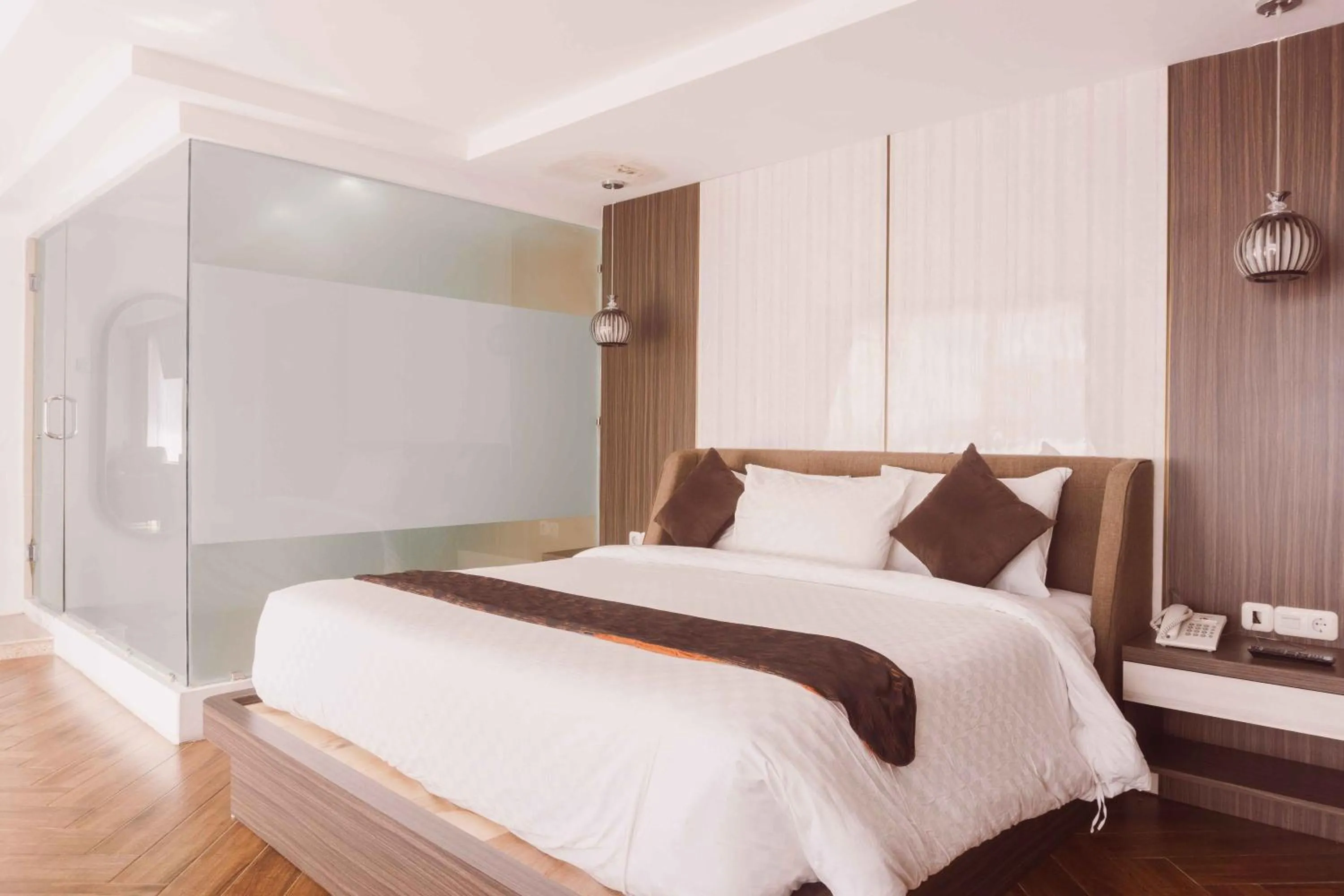 Bed in Fahira Hotel Syariah Bukittinggi