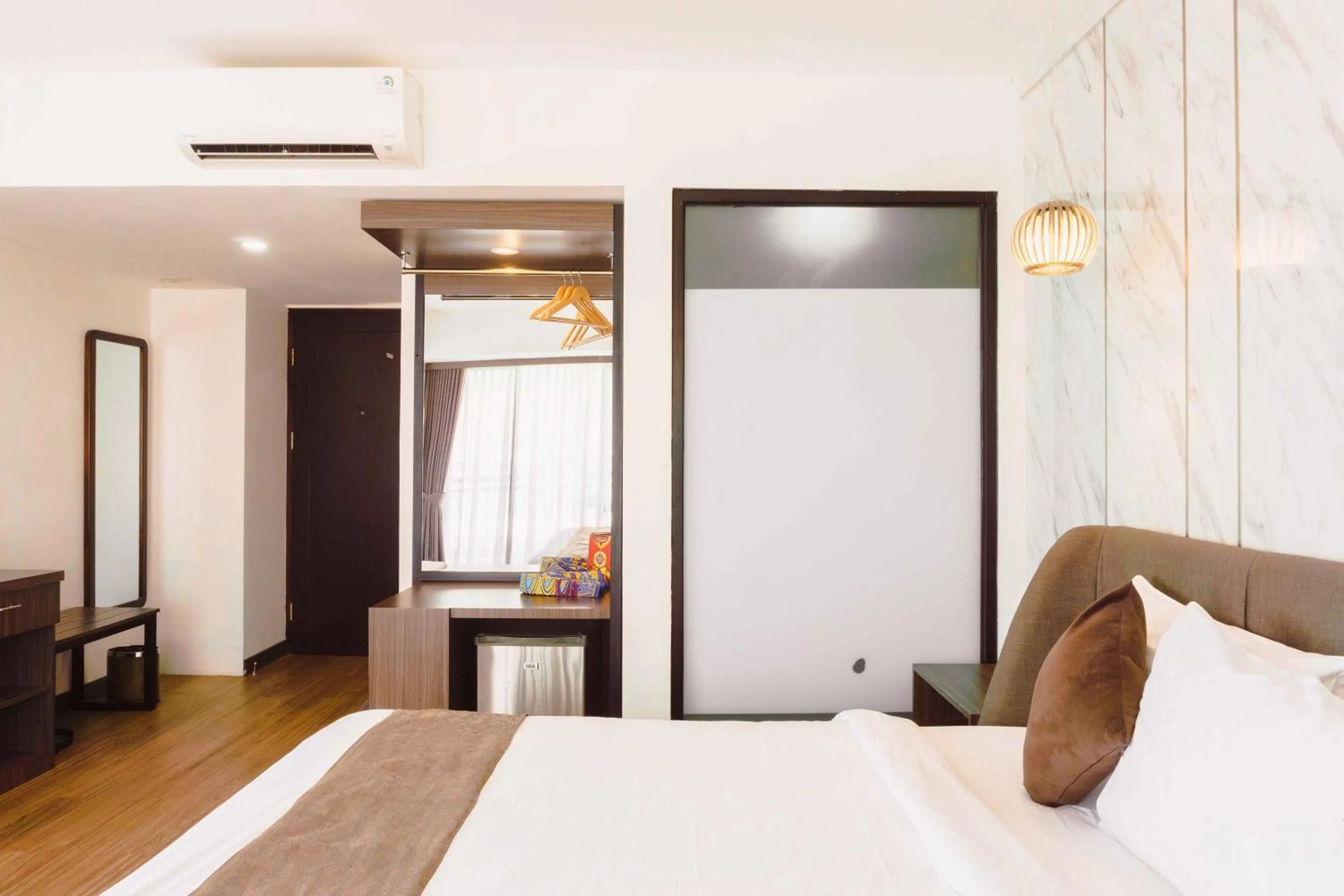 Bed in Fahira Hotel Syariah Bukittinggi