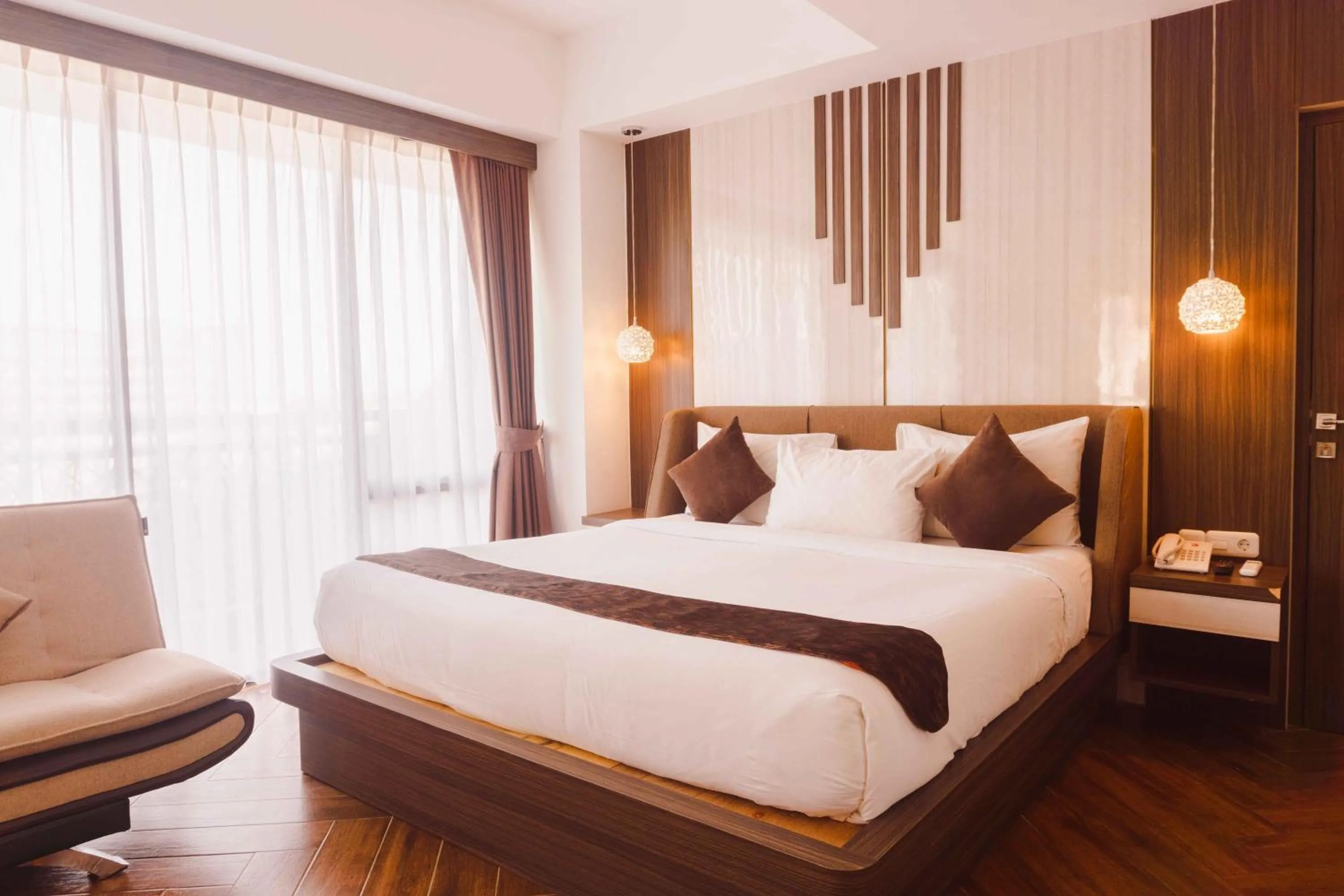 Bed in Fahira Hotel Syariah Bukittinggi