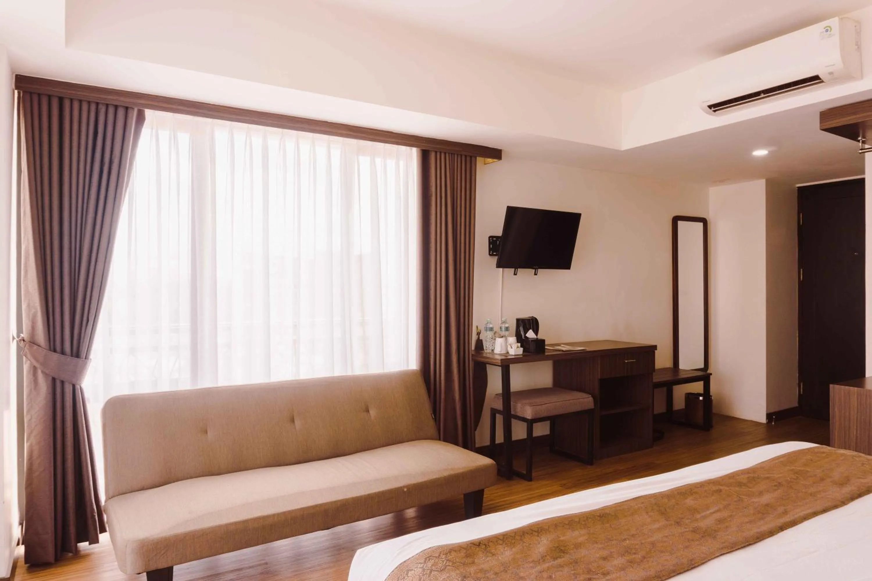Bed in Fahira Hotel Syariah Bukittinggi