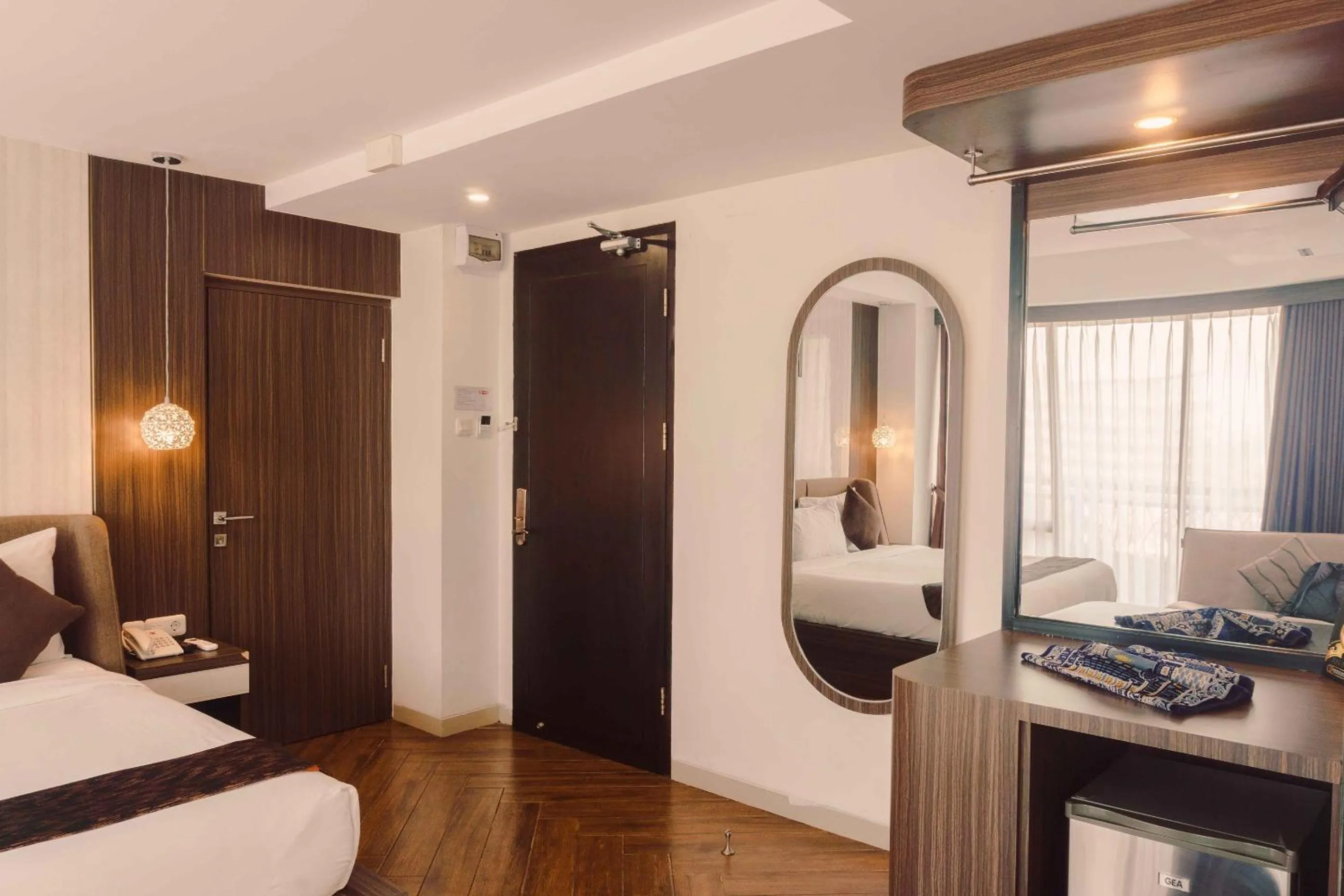 Bed in Fahira Hotel Syariah Bukittinggi
