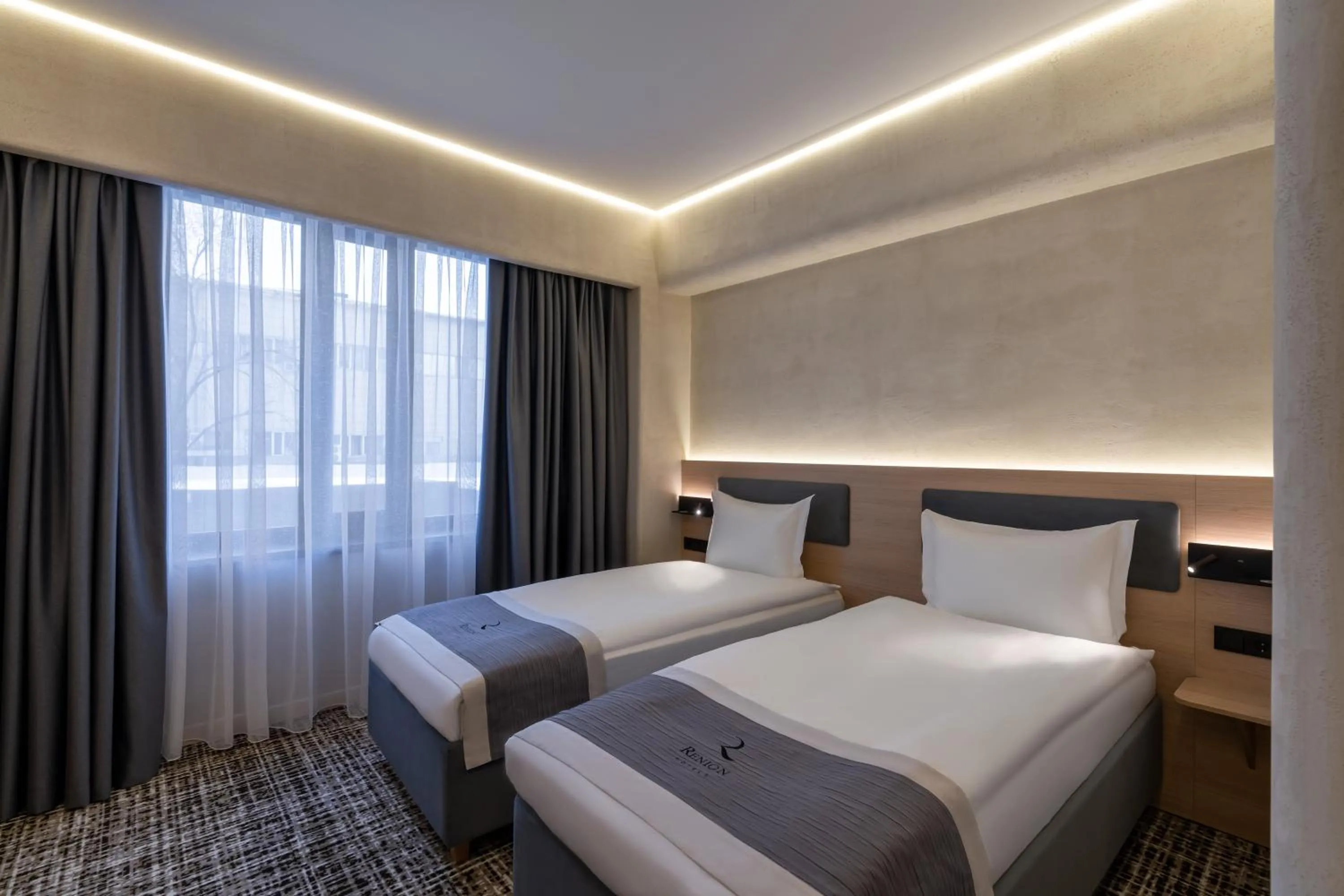 Bed in Renion City Hotel