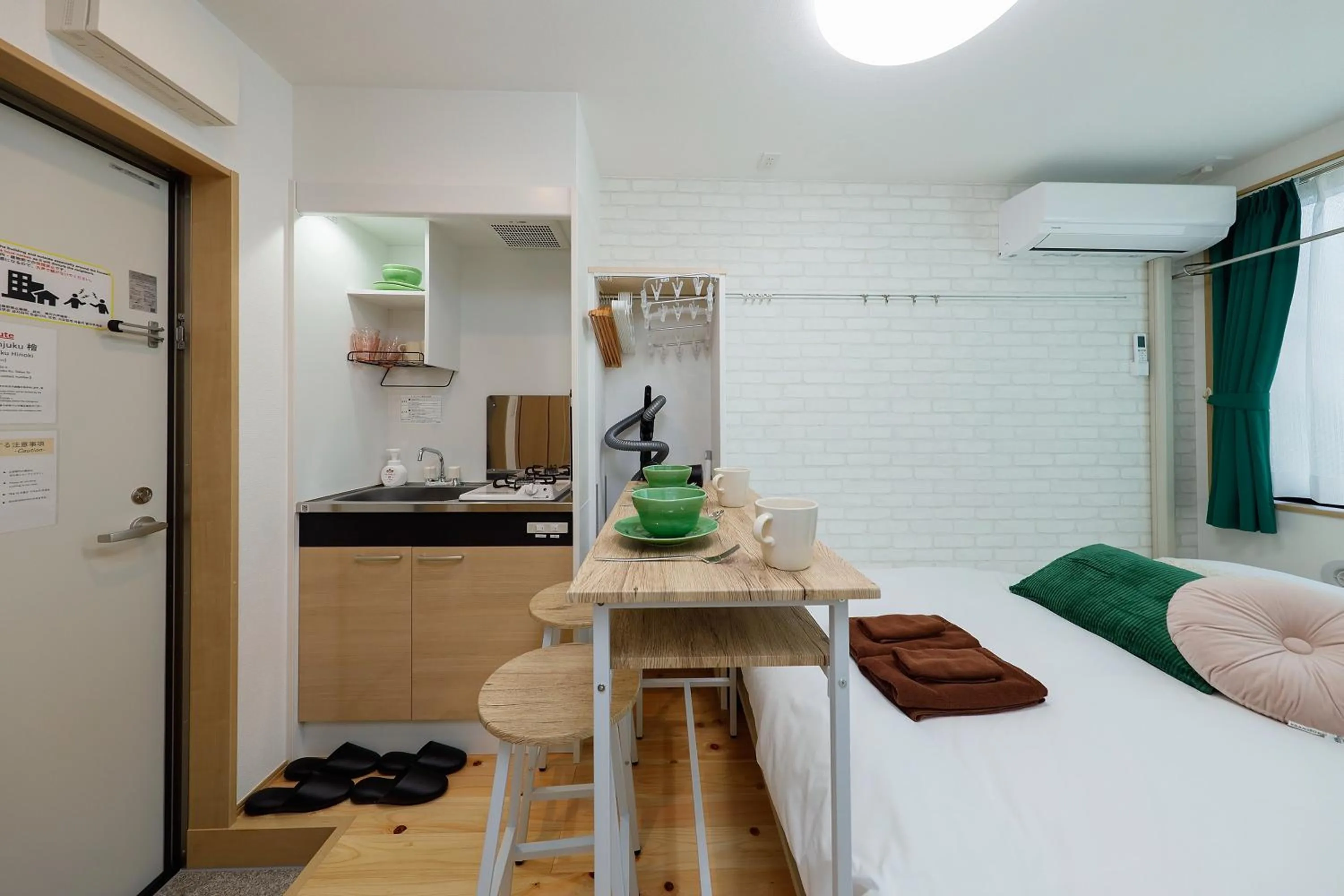 Bed in Zenith Shinjuku Hinoki by Tranova