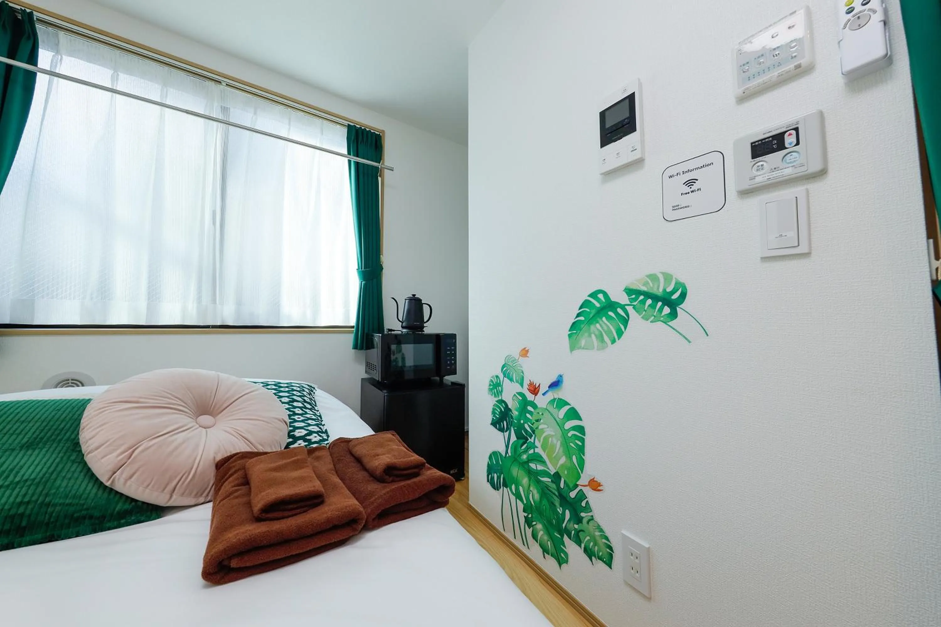 Bed in Zenith Shinjuku Hinoki by Tranova