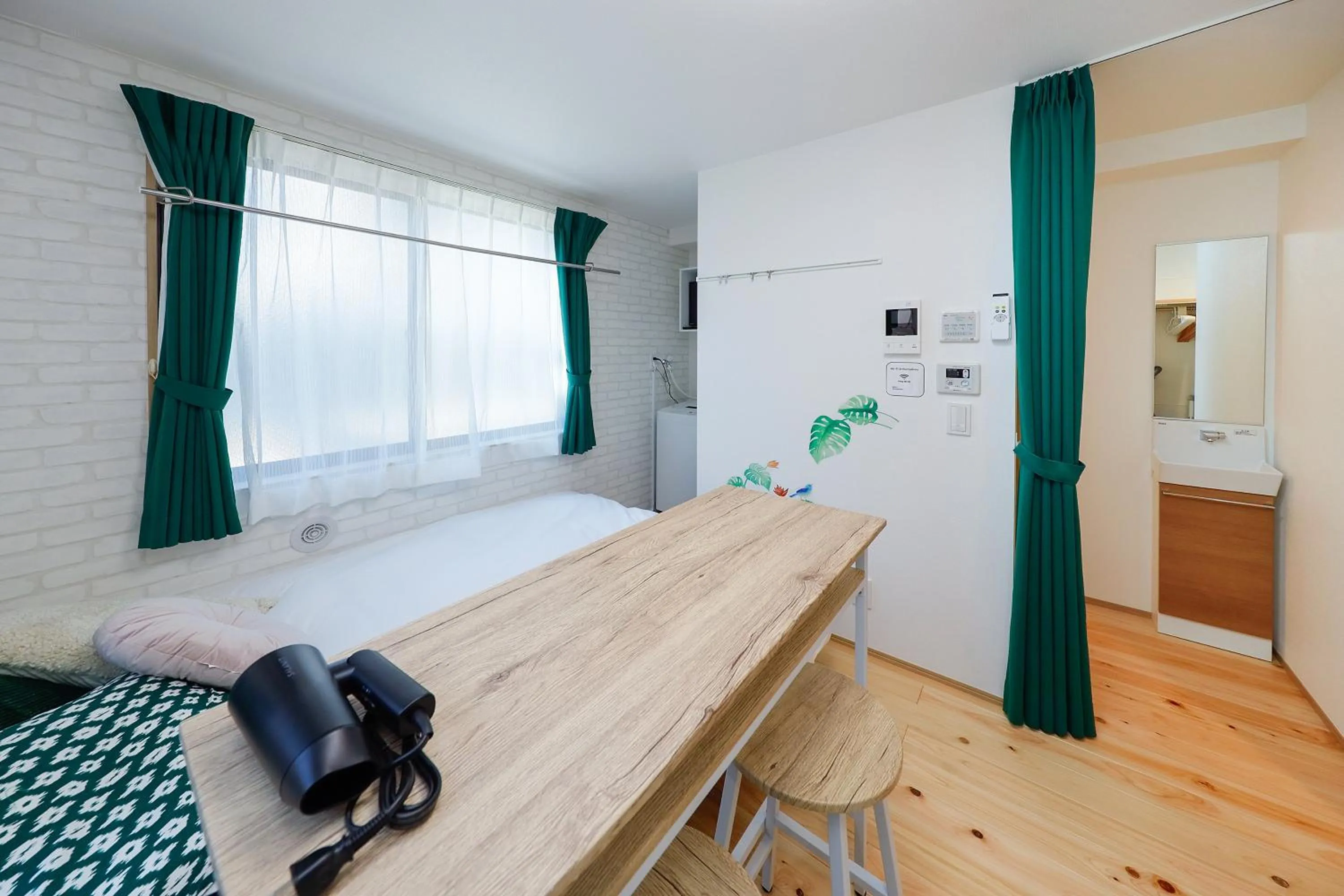 Bed in Zenith Shinjuku Hinoki by Tranova