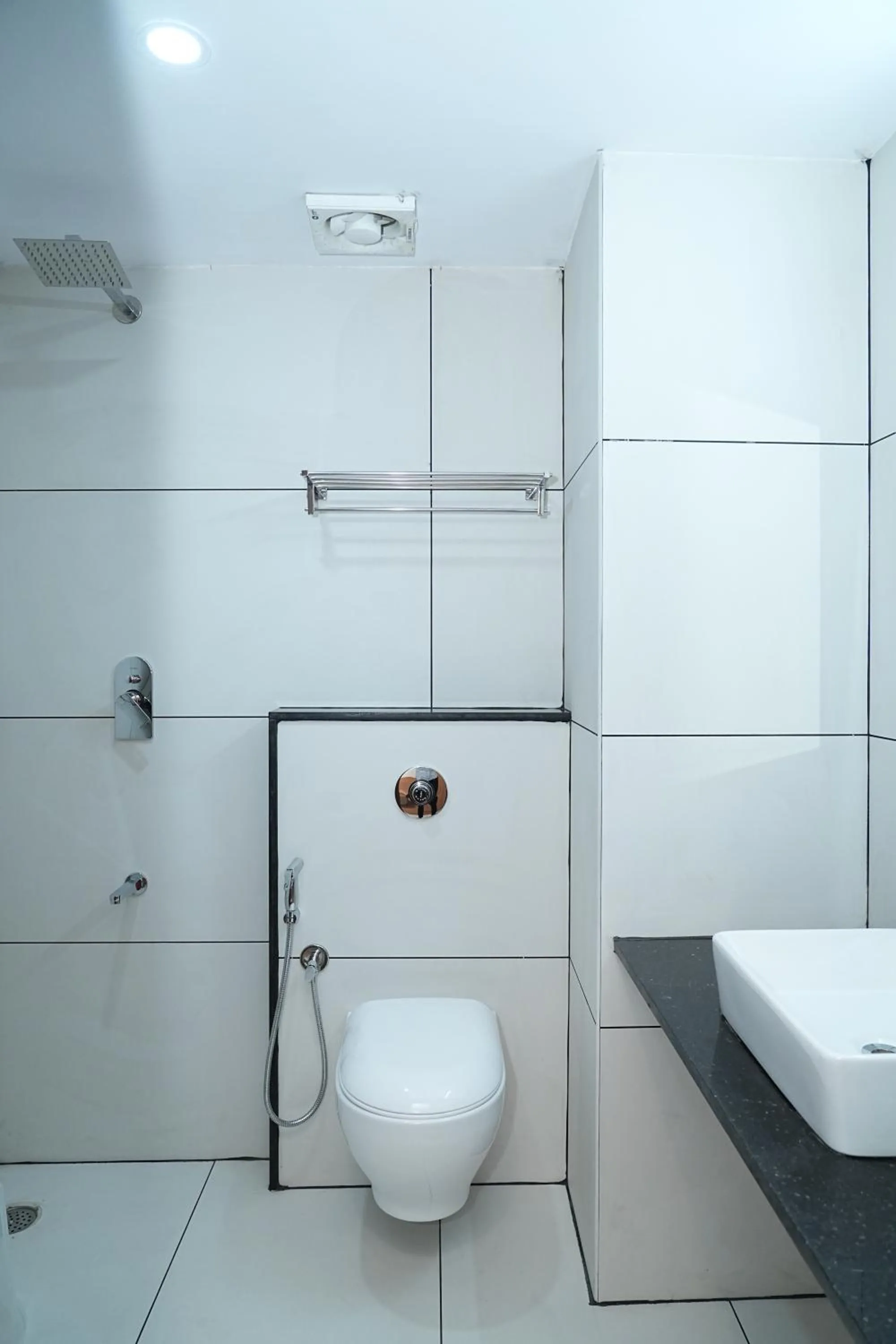 Shower in Hotel Kalyan Suites