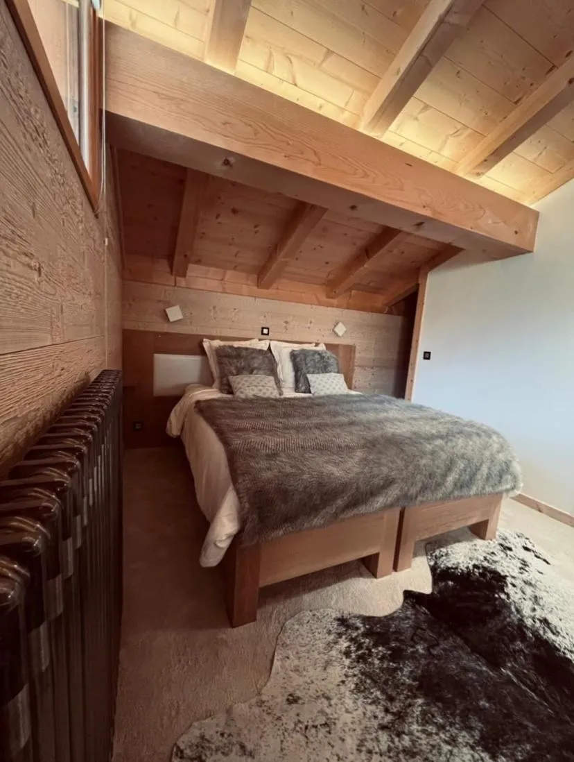 Bed in Chalet Inarpa - Appartements et Suites