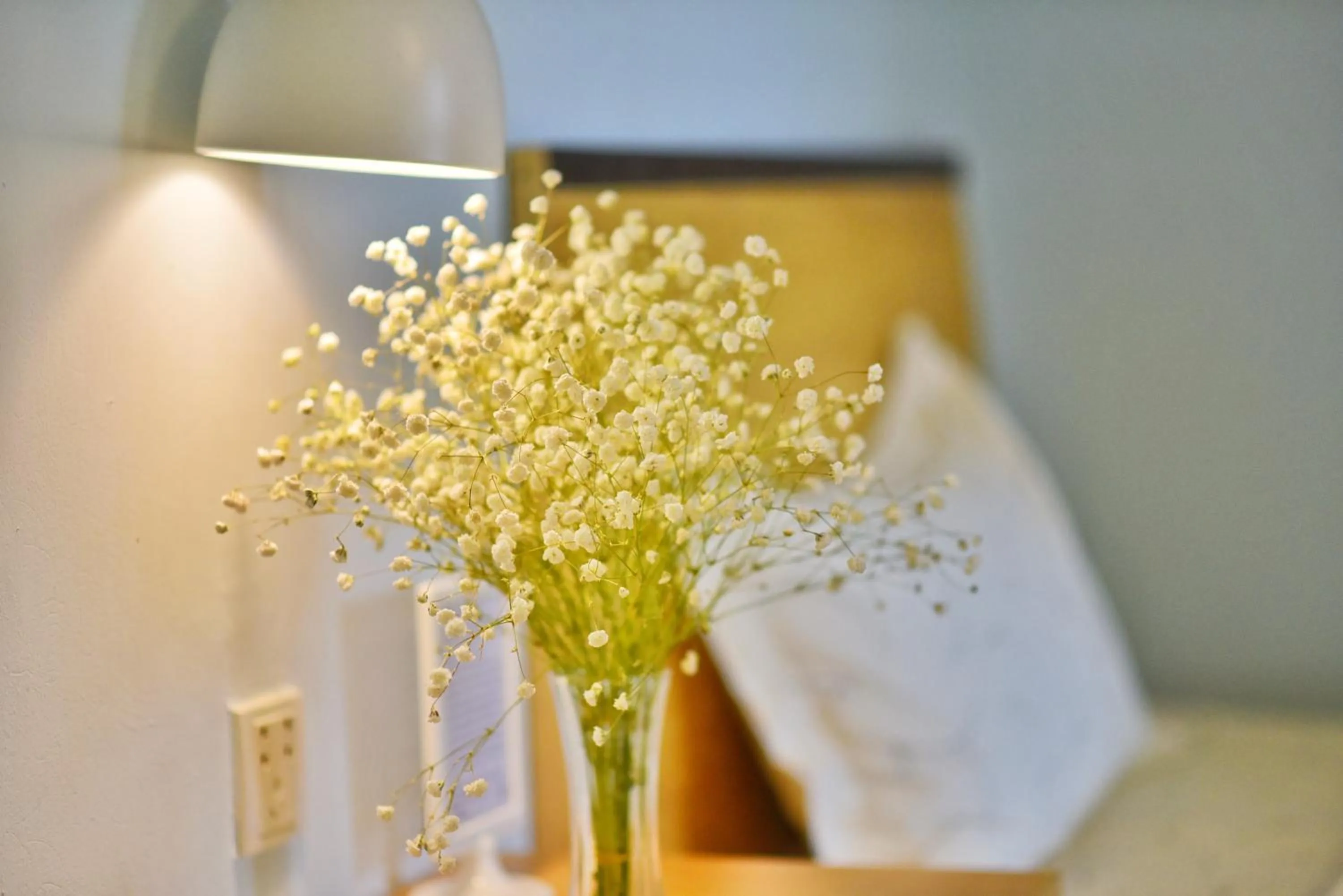 Decorative detail, Bed in Guilin Cyan Box Guest House