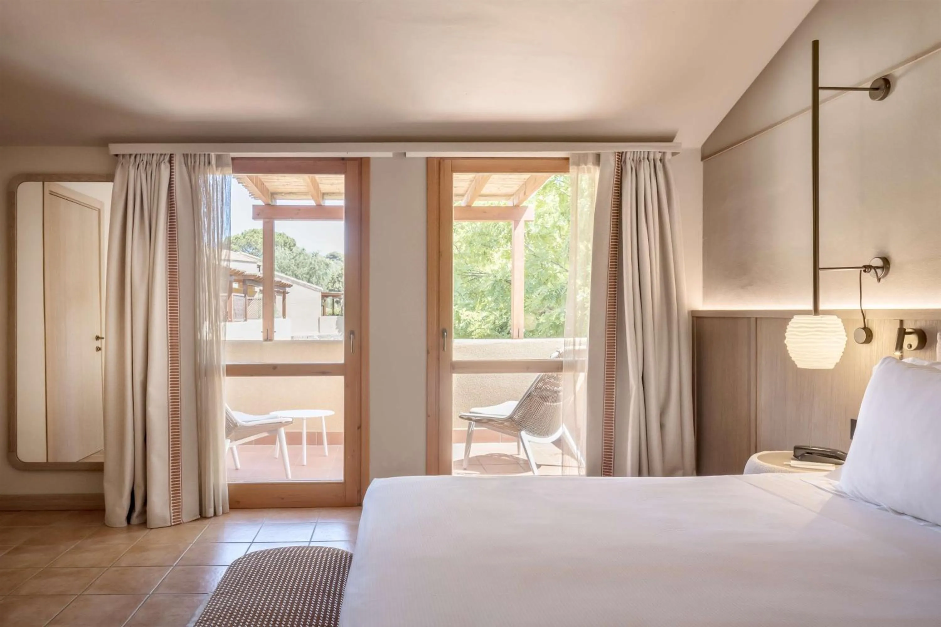 Photo of the whole room, Bed in Veridia Resort Sardinia, a member of Radisson Individuals