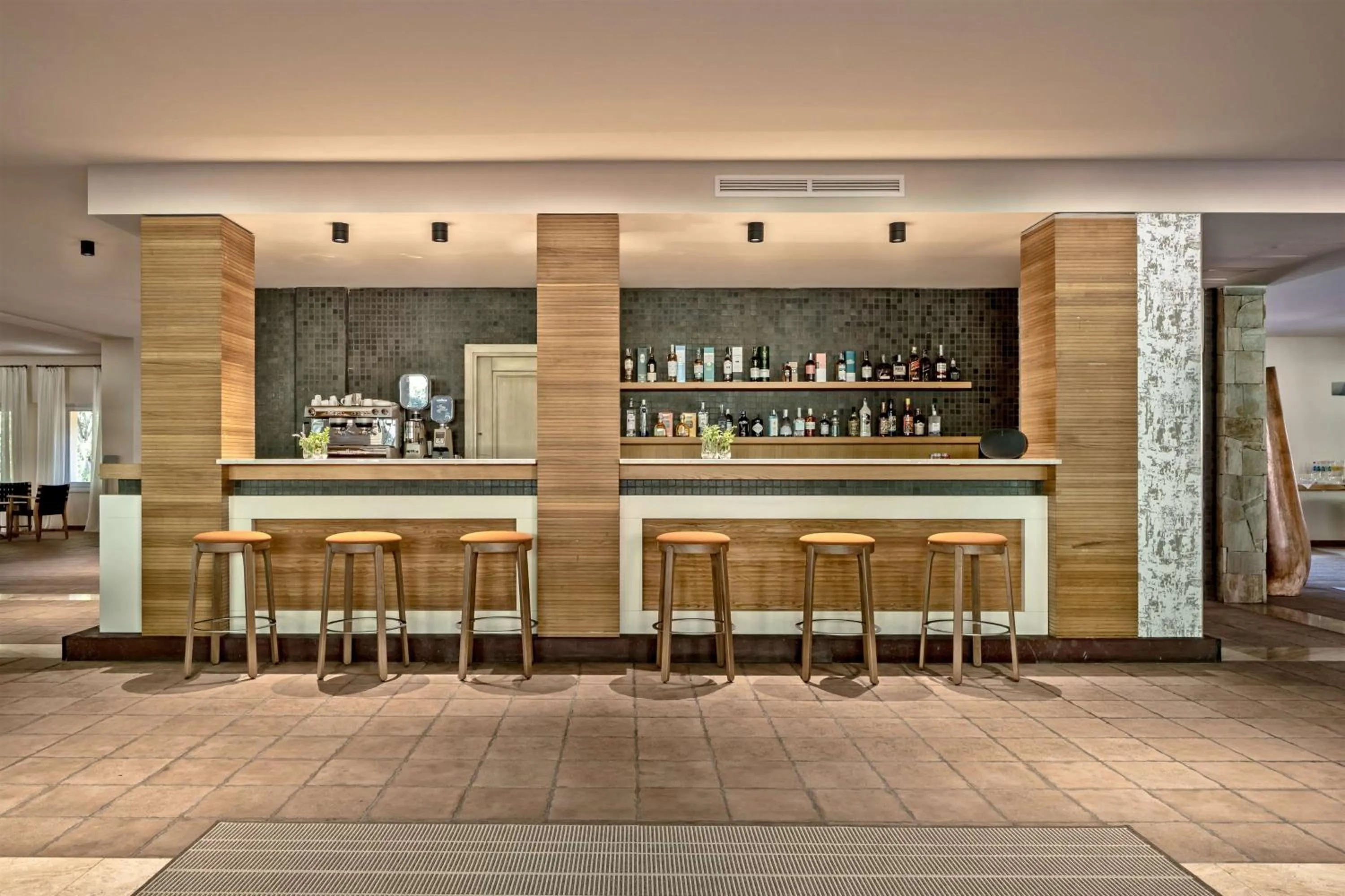 Lounge or bar in Veridia Resort Sardinia, a member of Radisson Individuals