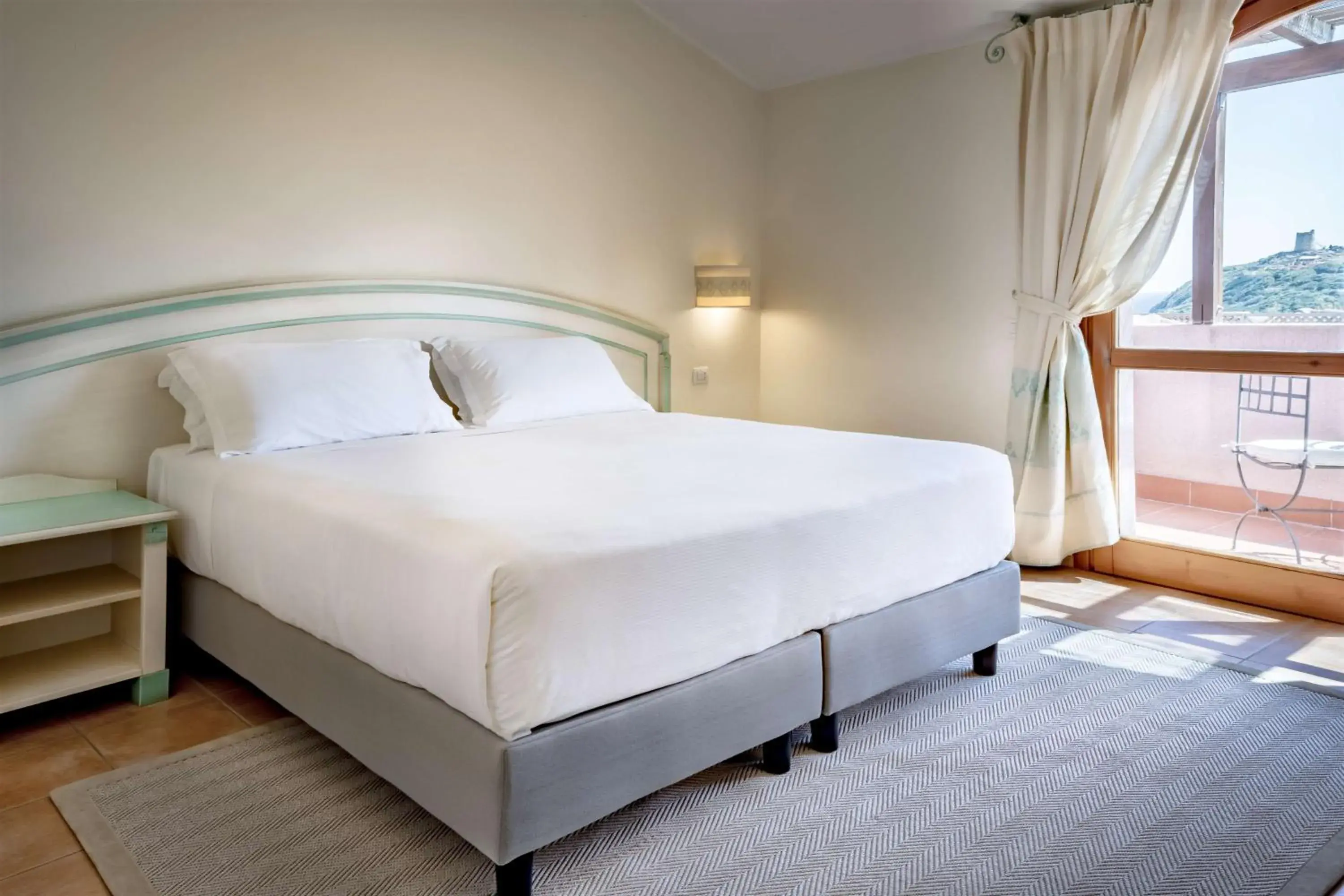 Bedroom, Bed in Veridia Resort Sardinia, a member of Radisson Individuals Bedroom, Bed in Veridia Resort Sardinia, a member of Radisson Individuals