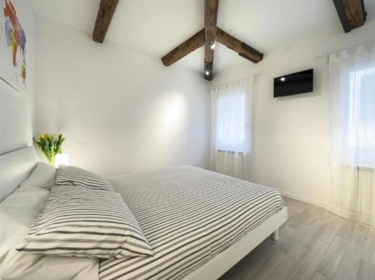 Bed in Ca' dei Scorsoni Apartments