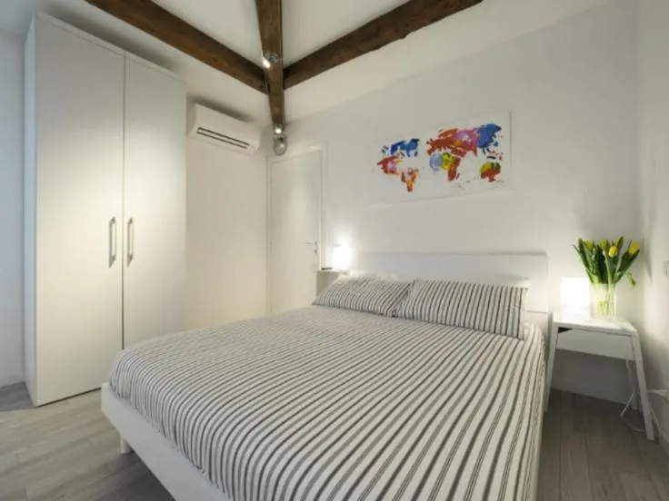 Bed in Ca' dei Scorsoni Apartments