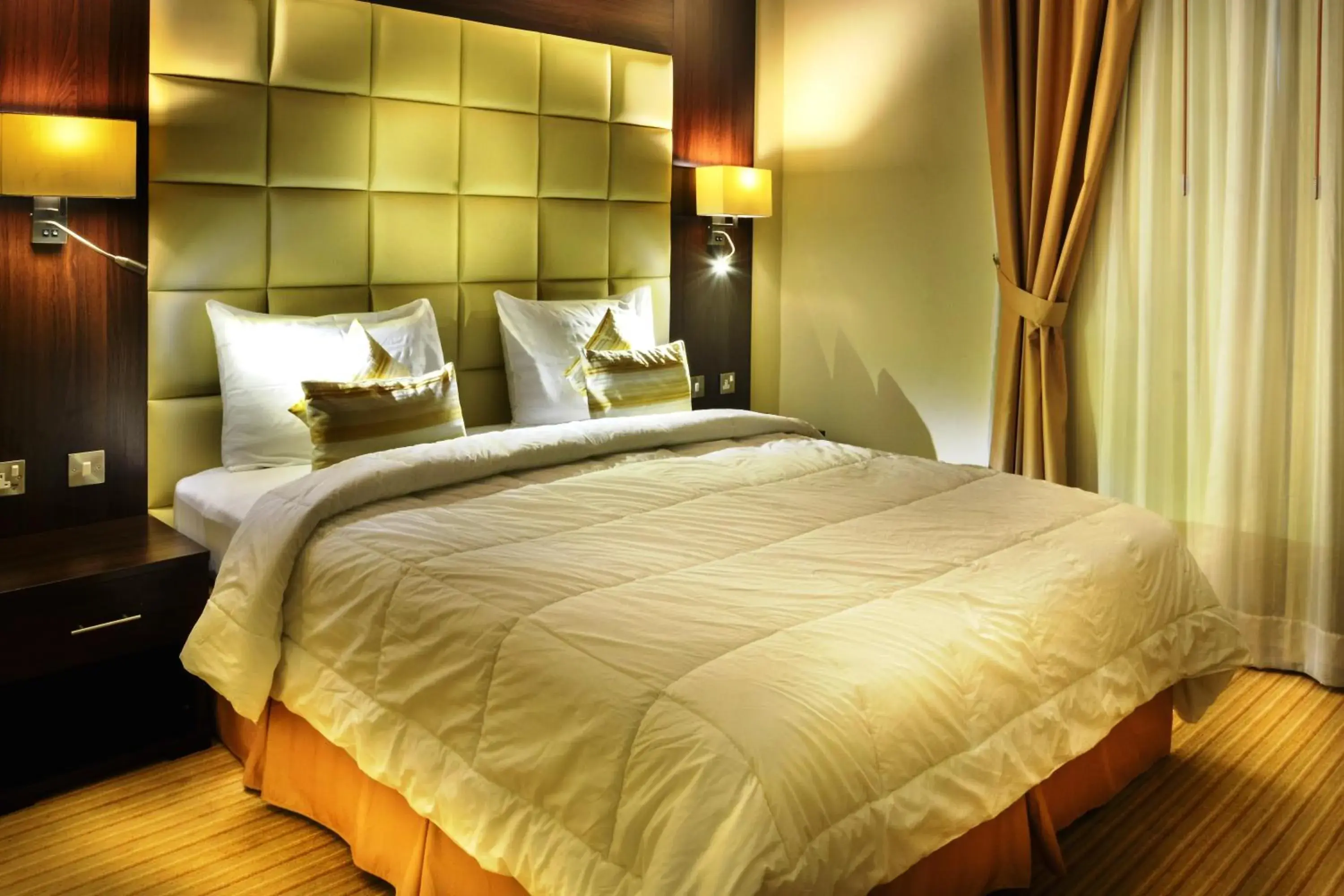 Bed in Golden Ocean Hotel