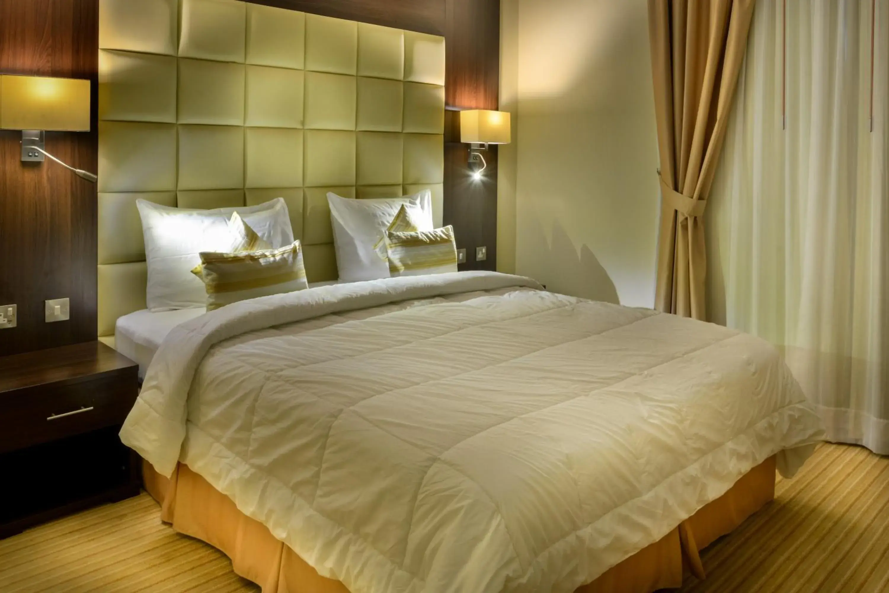 Bed in Golden Ocean Hotel