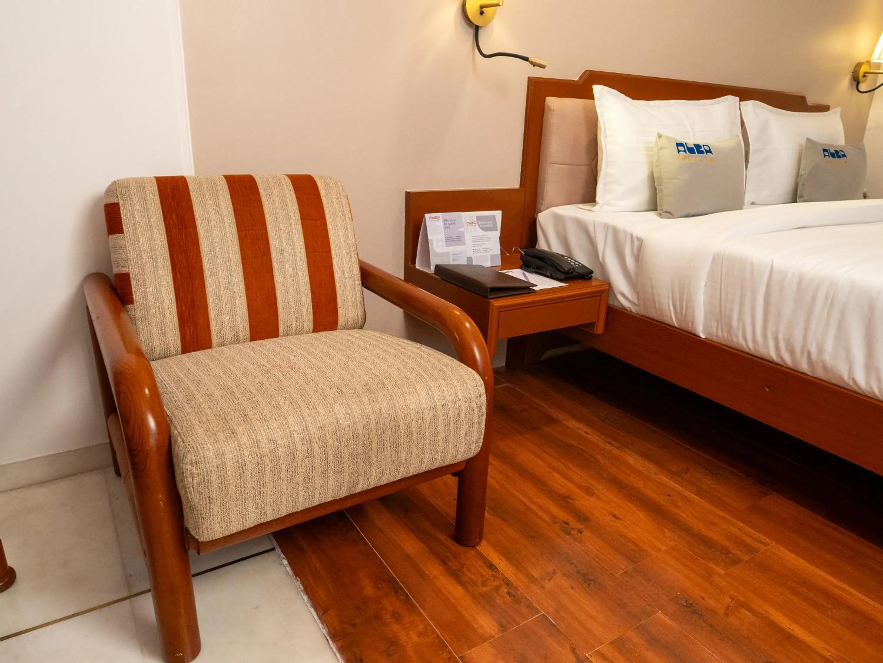 Seating area, Bed in Hotel Pravasa Stay
