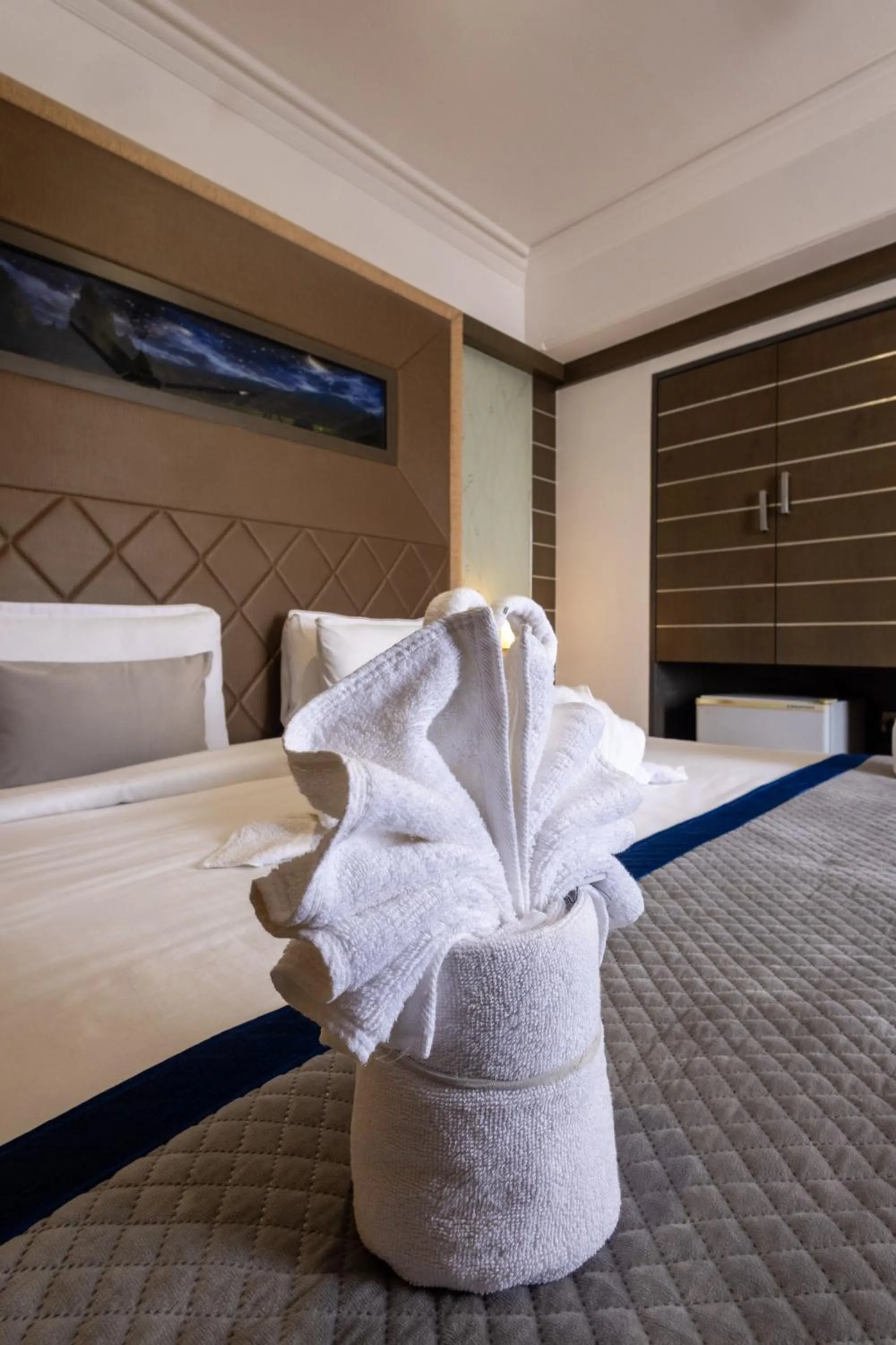 towels, Bed in Hotel Pravasa Stay