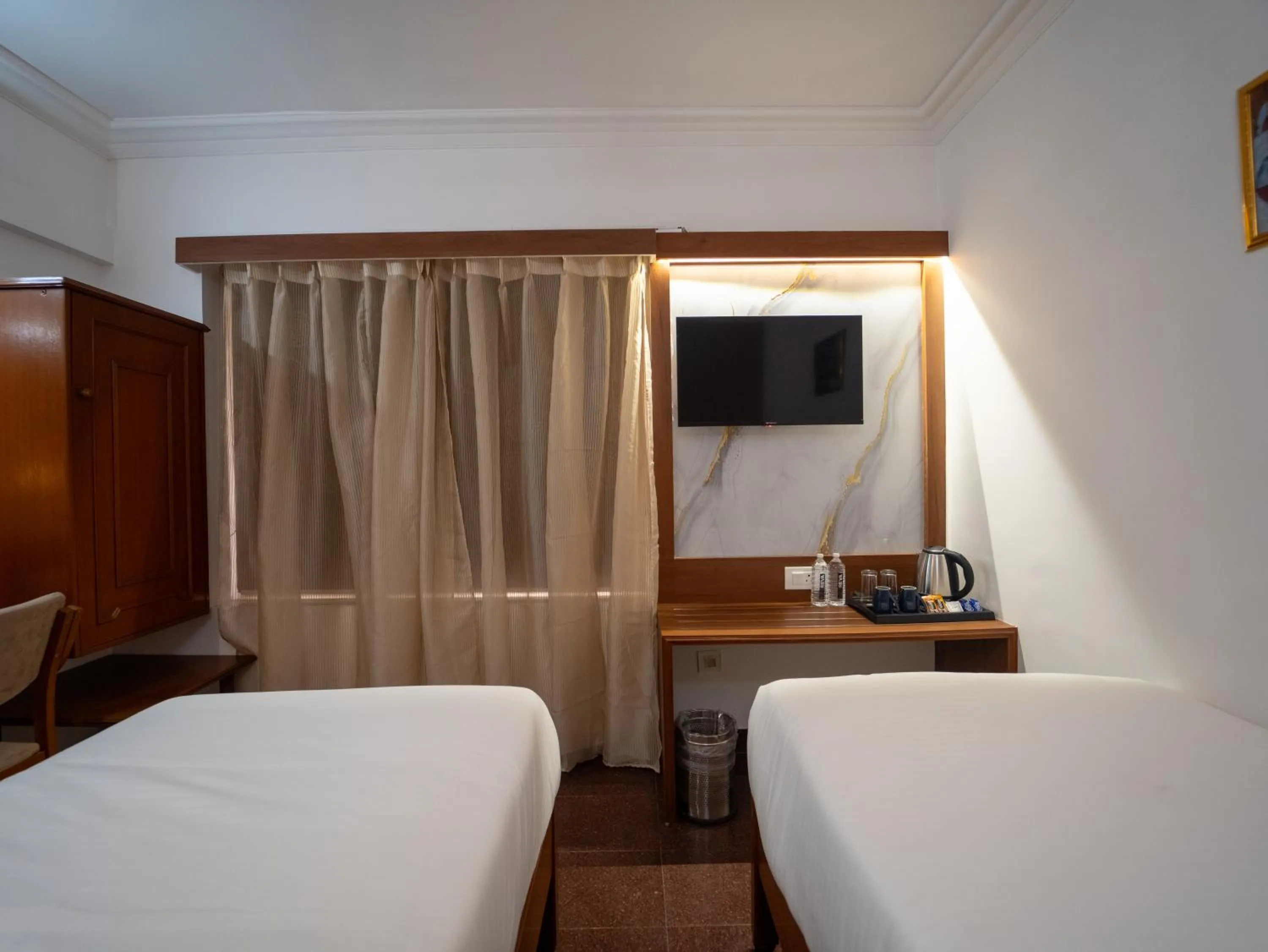 Bed in Hotel Pravasa Stay
