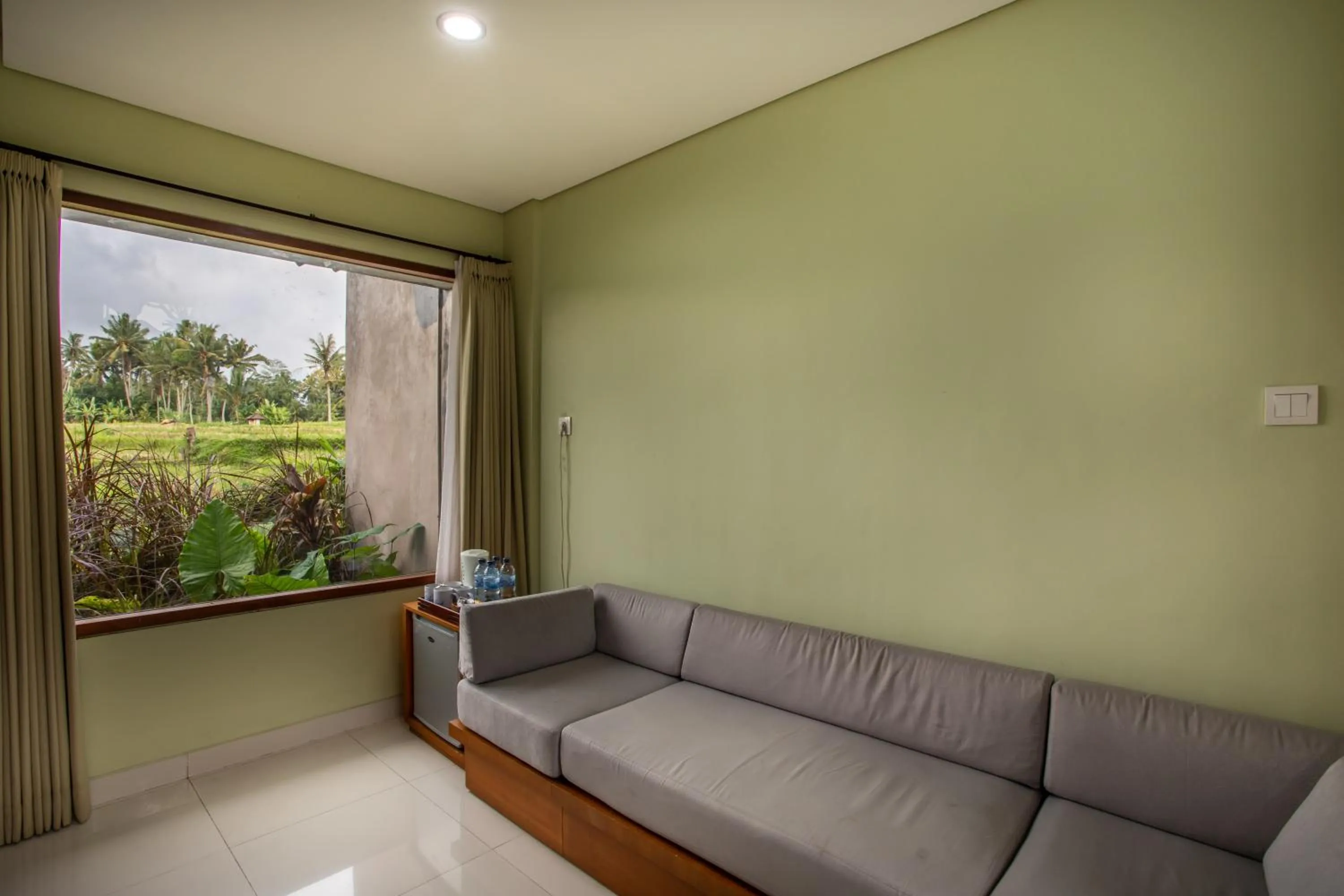 Seating area in Bakung Ubud Resort and Villa