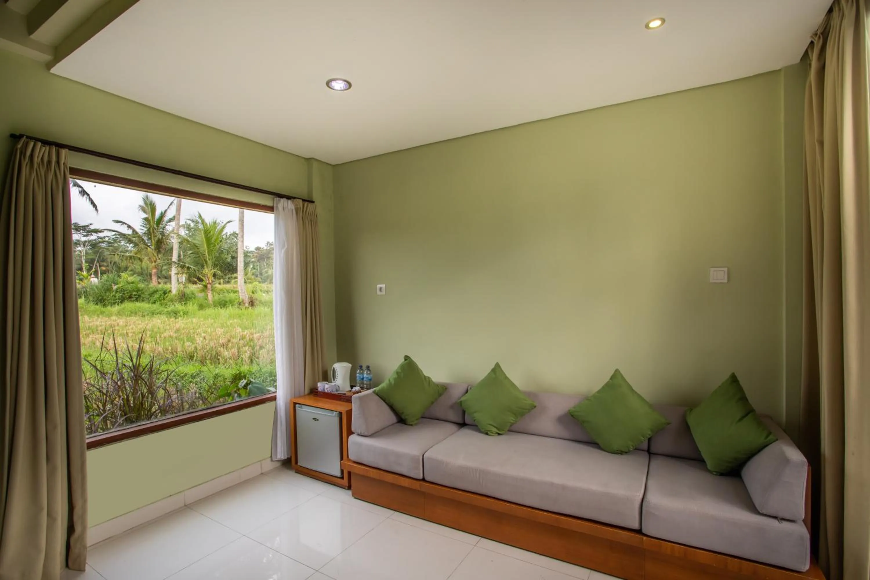 Seating area in Bakung Ubud Resort and Villa