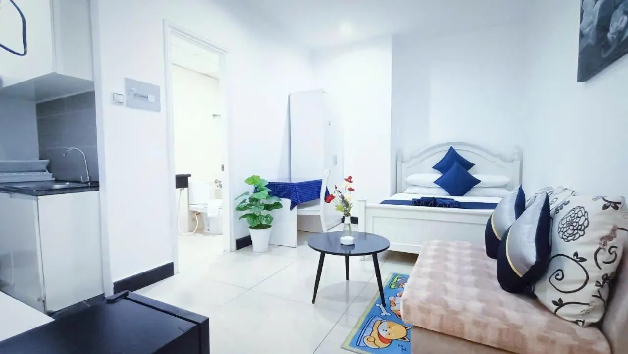 Bed in Queen Central Apartment Hotel