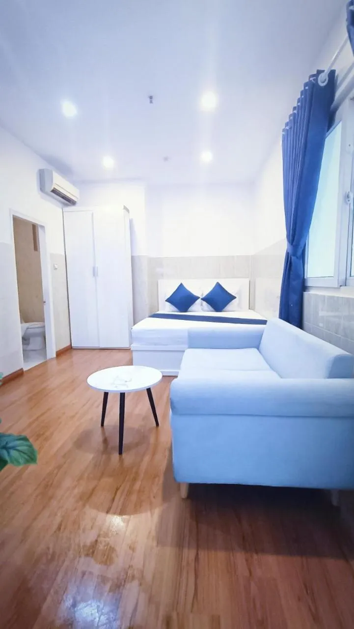 Bed in Queen Central Apartment Hotel