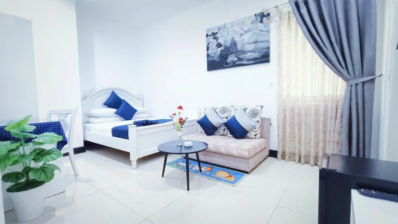 Bed in Queen Central Apartment Hotel