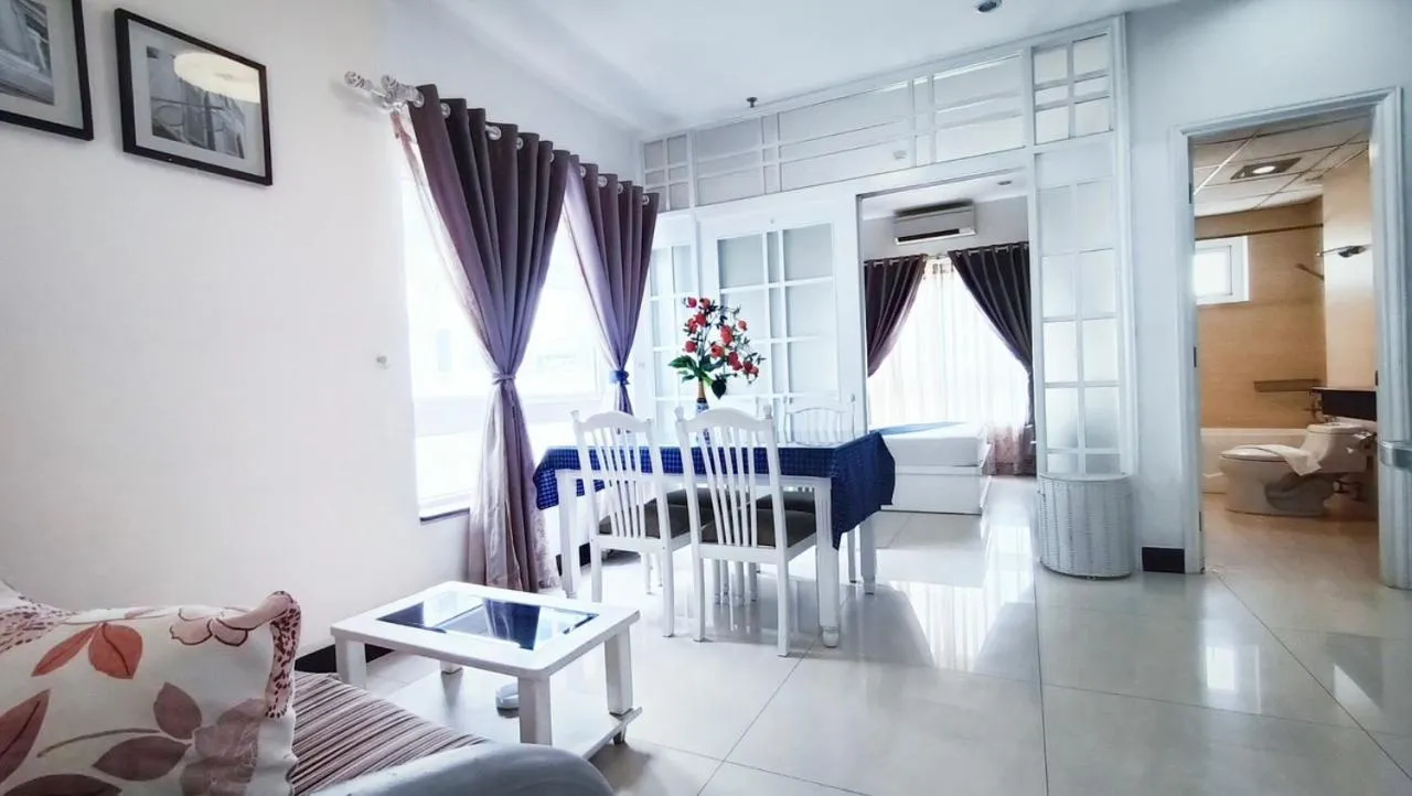 Bed in Queen Central Apartment Hotel