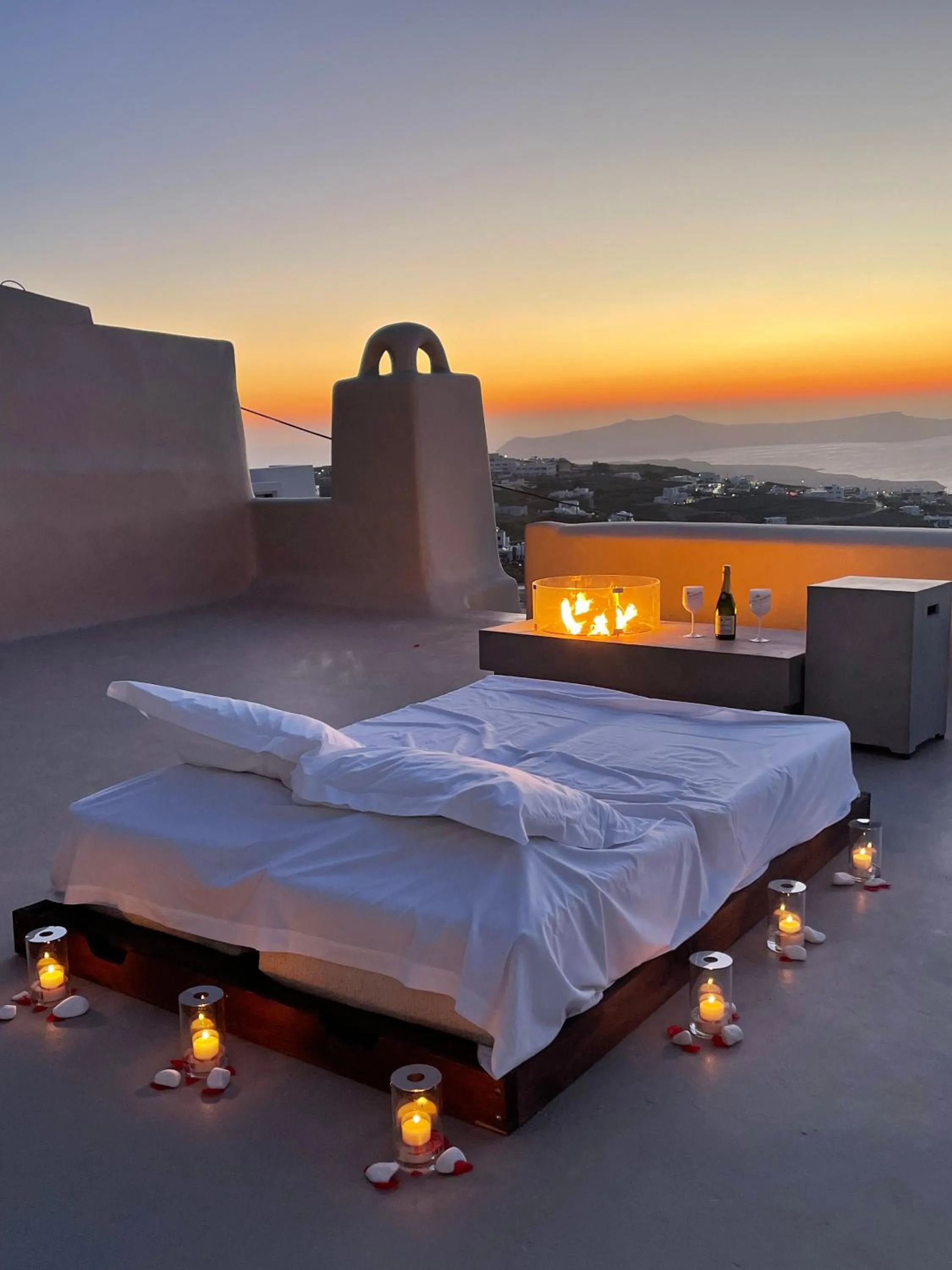 fireplace, Bed in Luna Santorini Suites