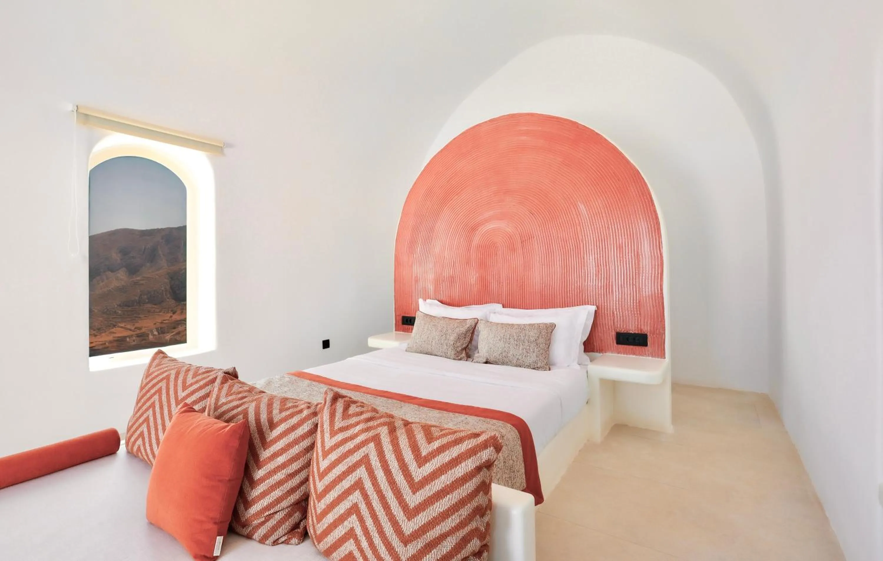 Bed in Luna Santorini Suites
