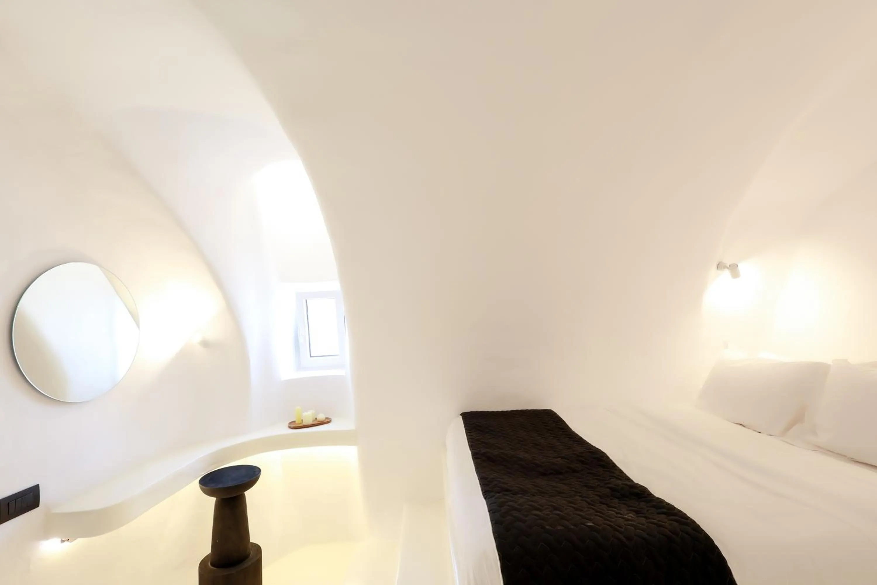 Bed in Luna Santorini Suites